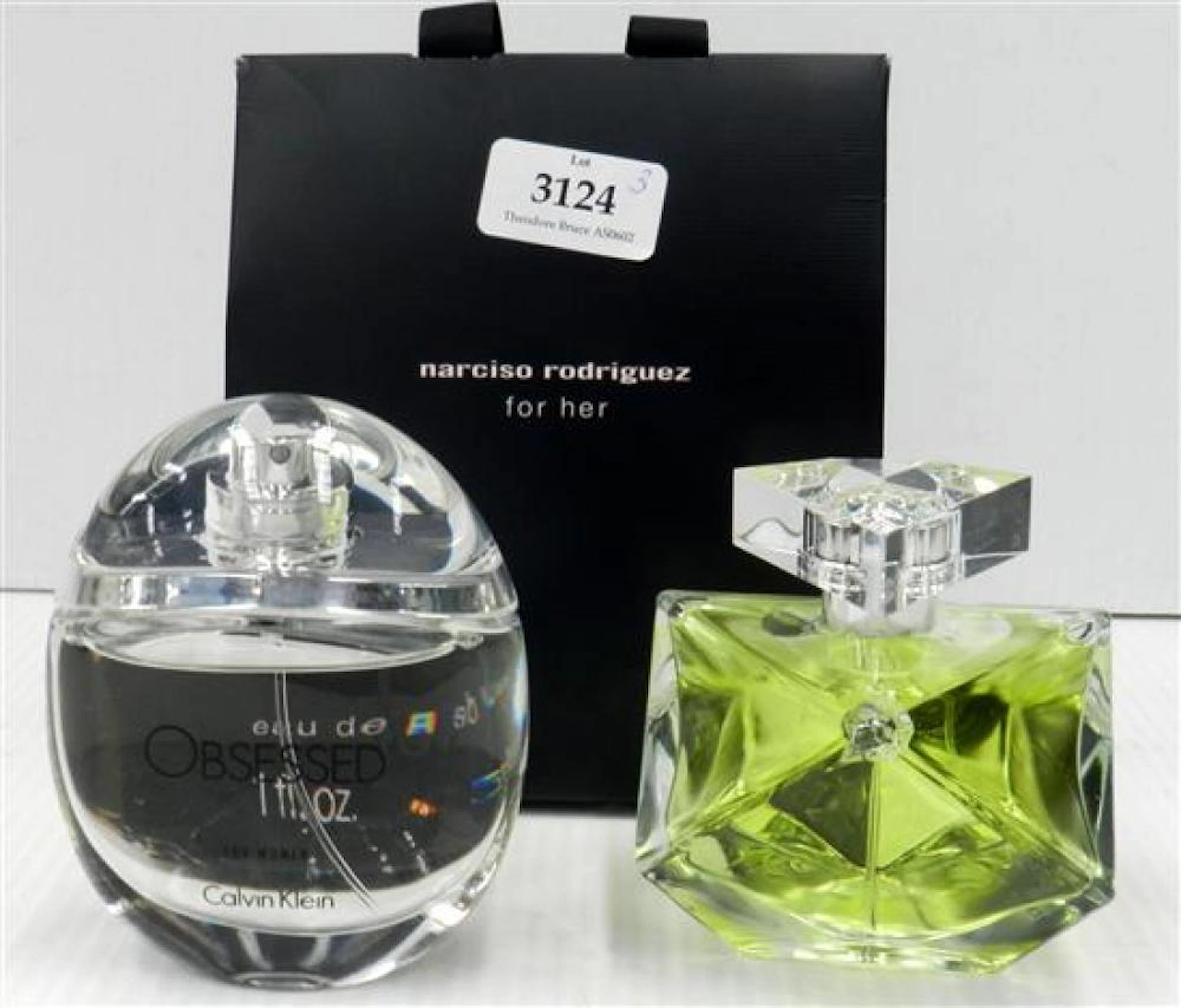 Assorted scents & lotions marked Calvin Klein Obsessed