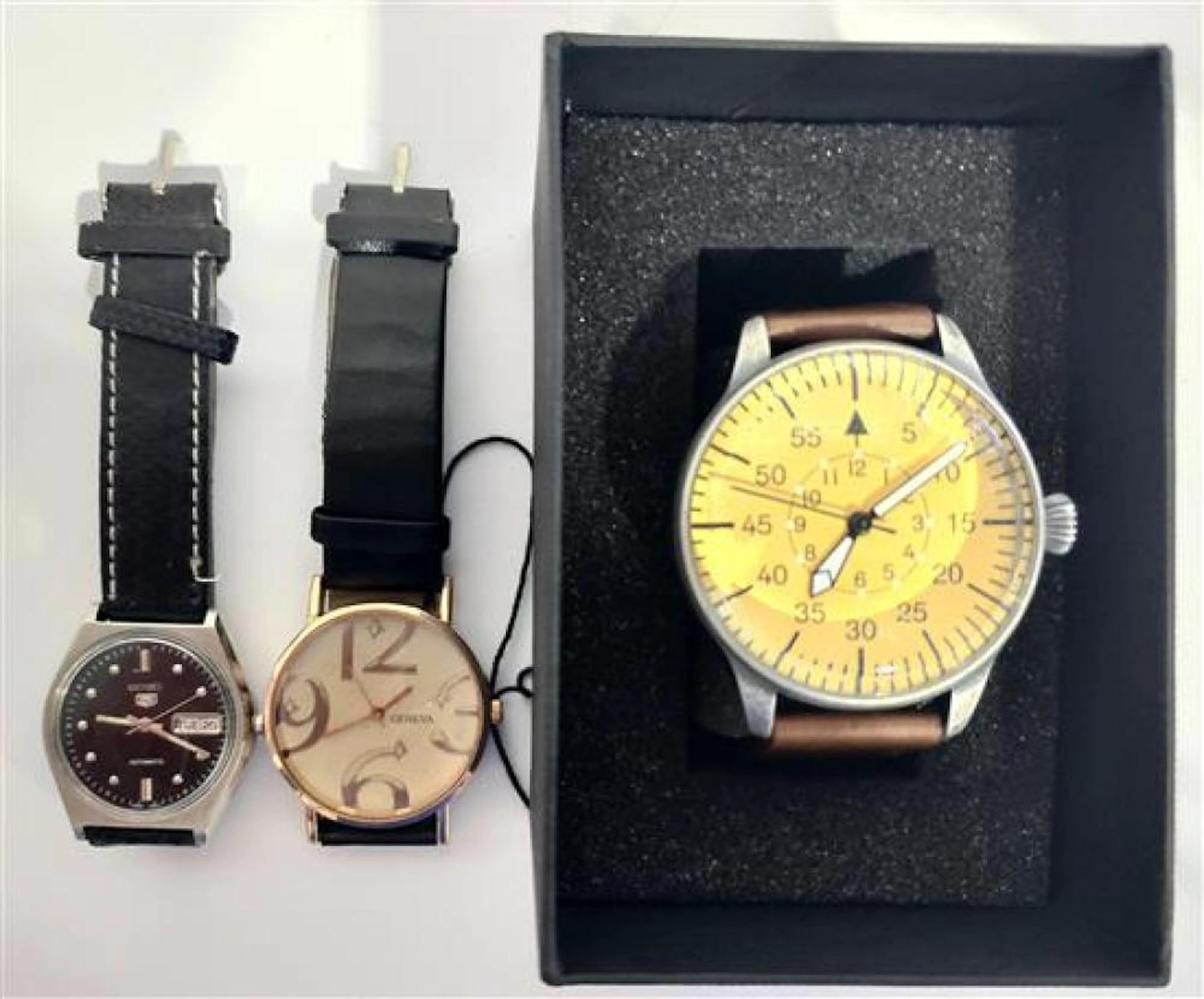 Three gentleman's wrist watches marked Seiko, Geneva & Mil-t