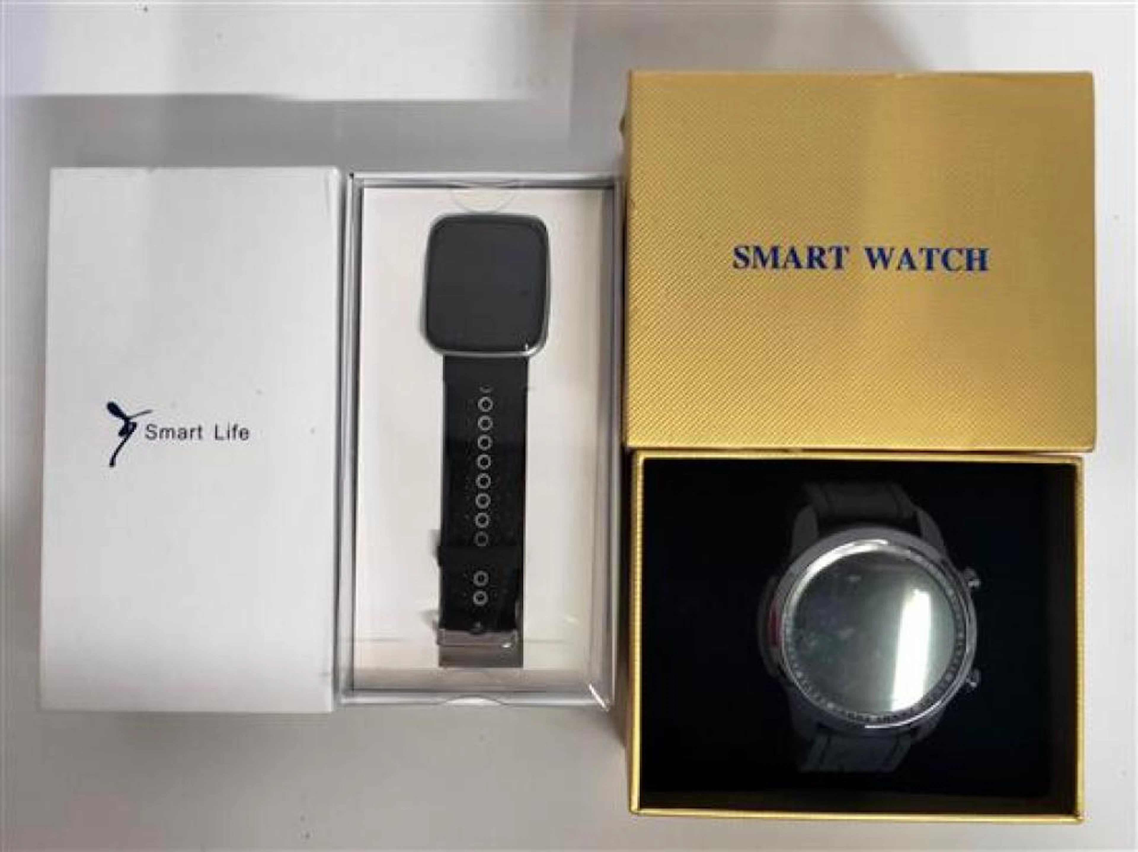 Two assorted smat watches incl