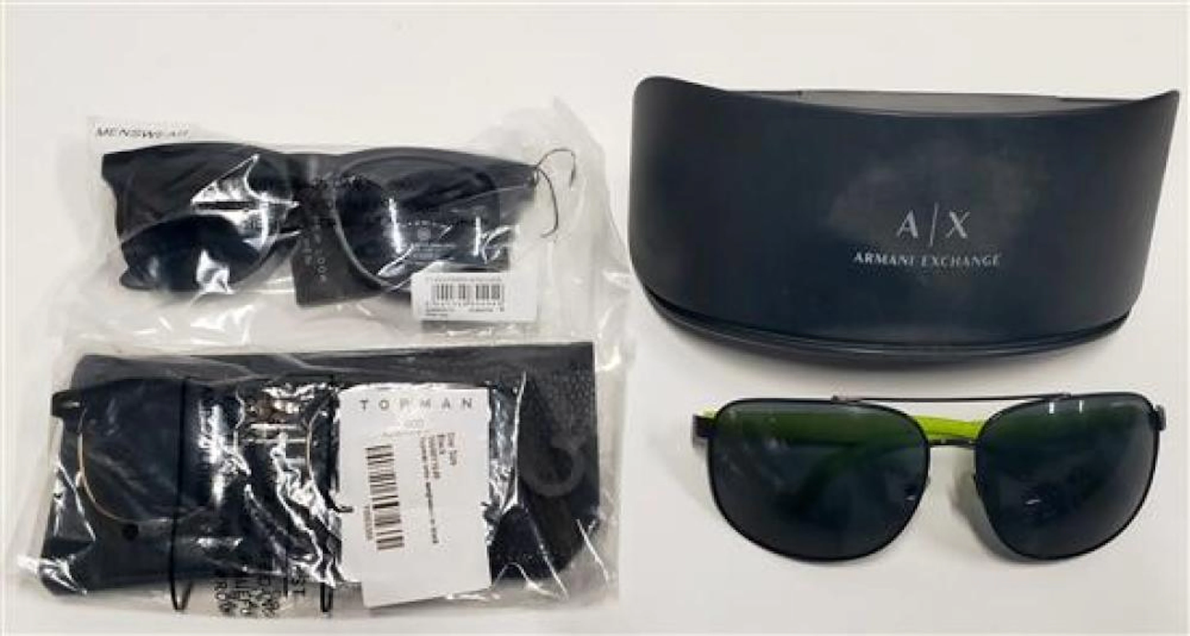 Three pairs of men's new & used sunglasses marked Armani Exchange