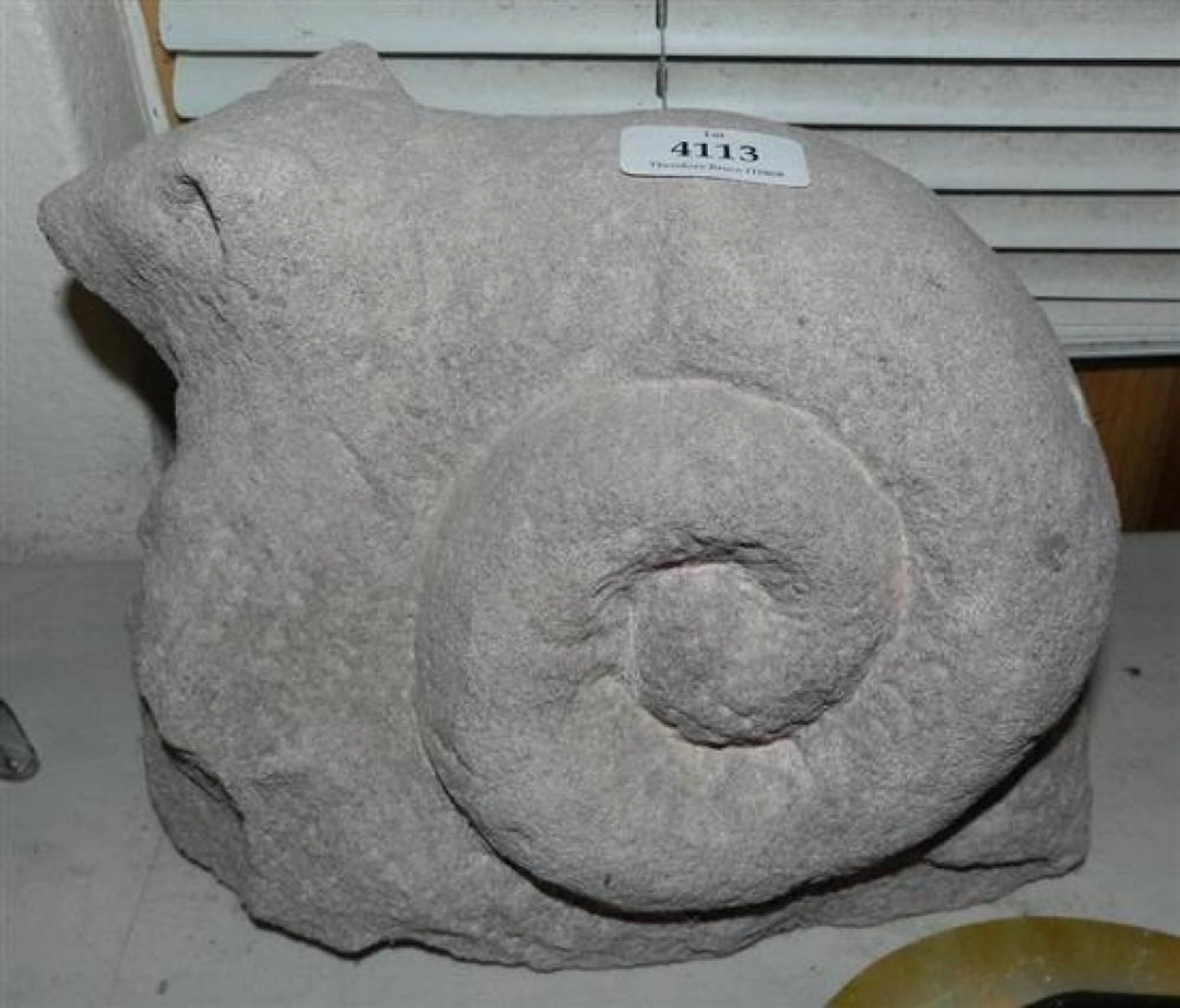 A Sandstone Sculpture of a Ring Tail Possum