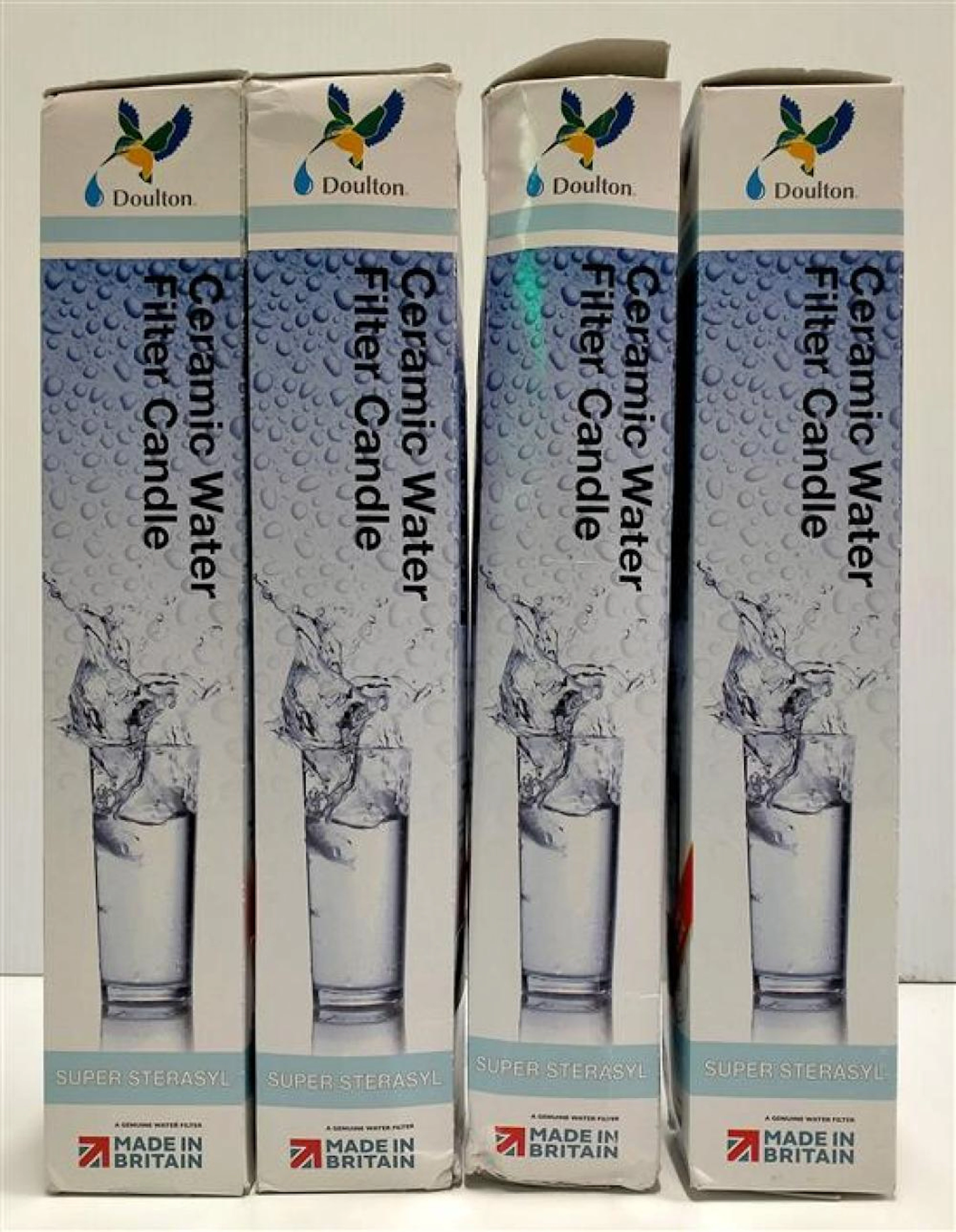 Four ceramic water filters marked Doulton