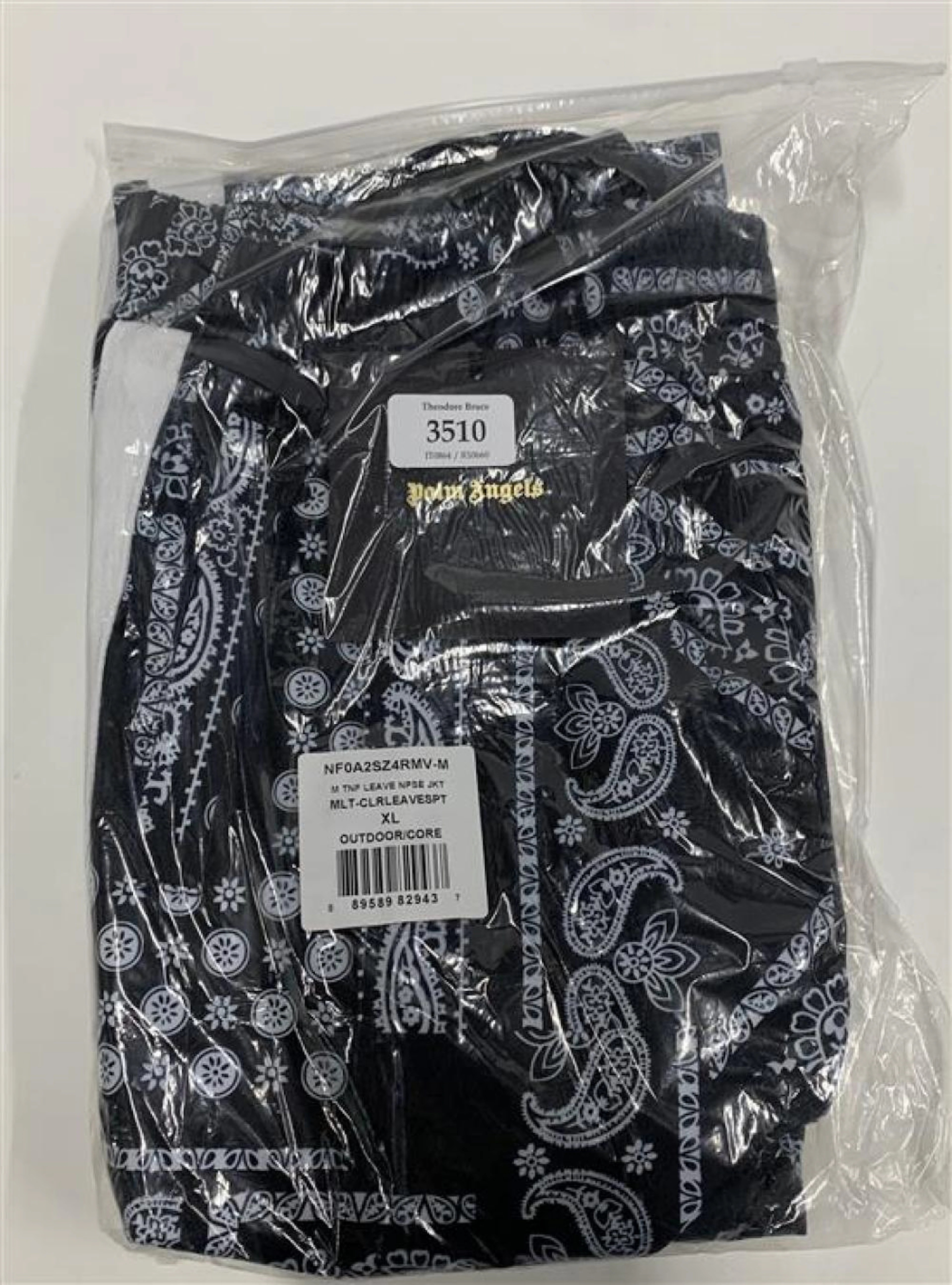 A pair of draw string pants marked Palm Angels size XL