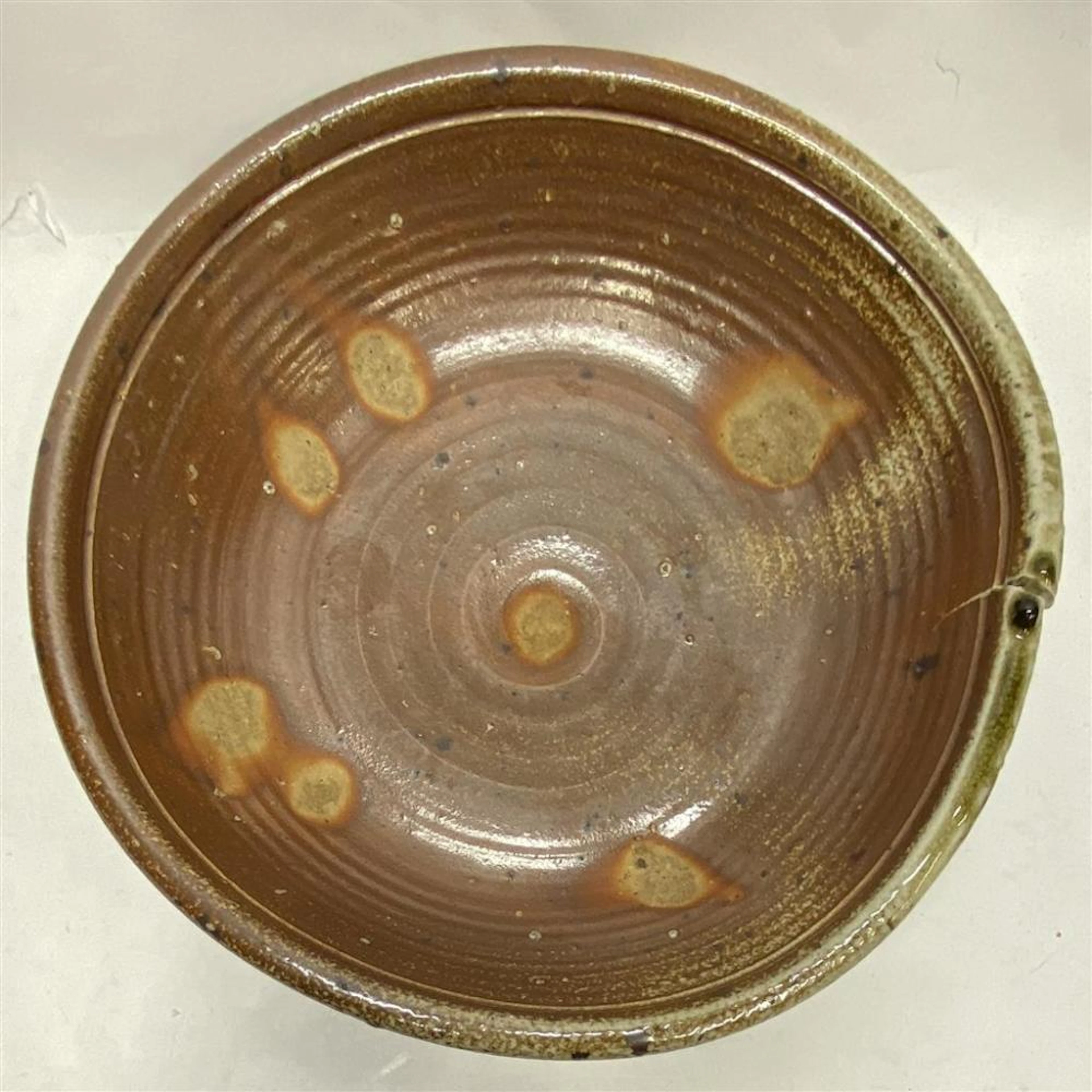 A Large Japanese Salt Glazed Shallow Bowl Tear from...