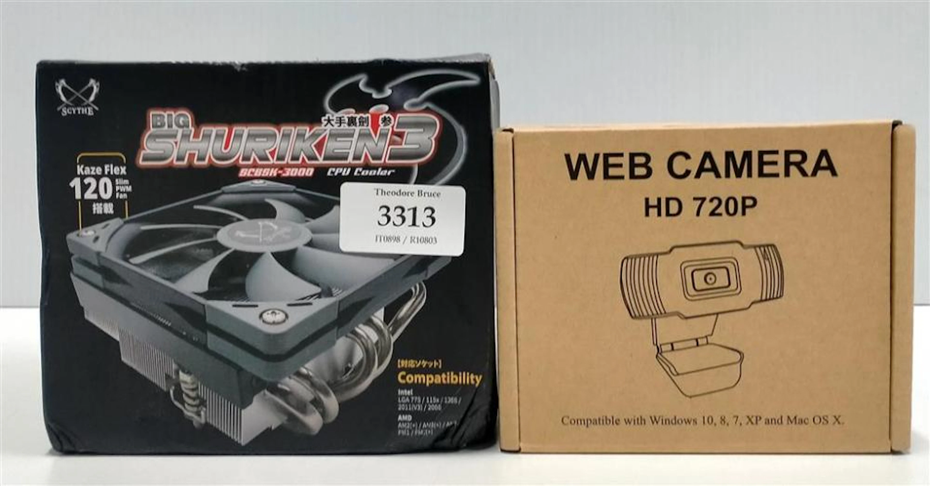 A CPU cooler marked Bid Shuriken 3 plus web camera