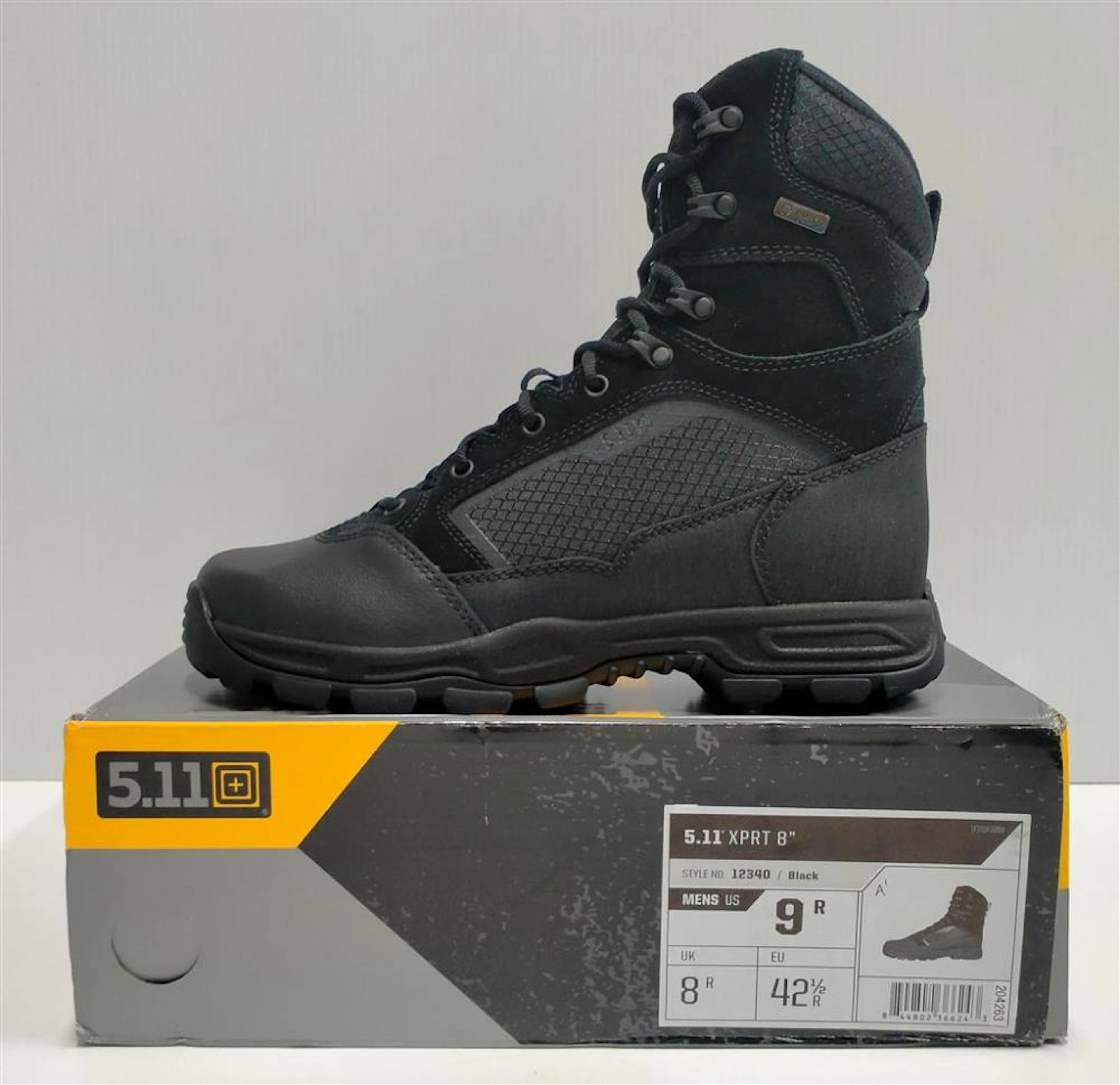 A pair of mens boots marked 5.11 Tactical size UK 8r in box