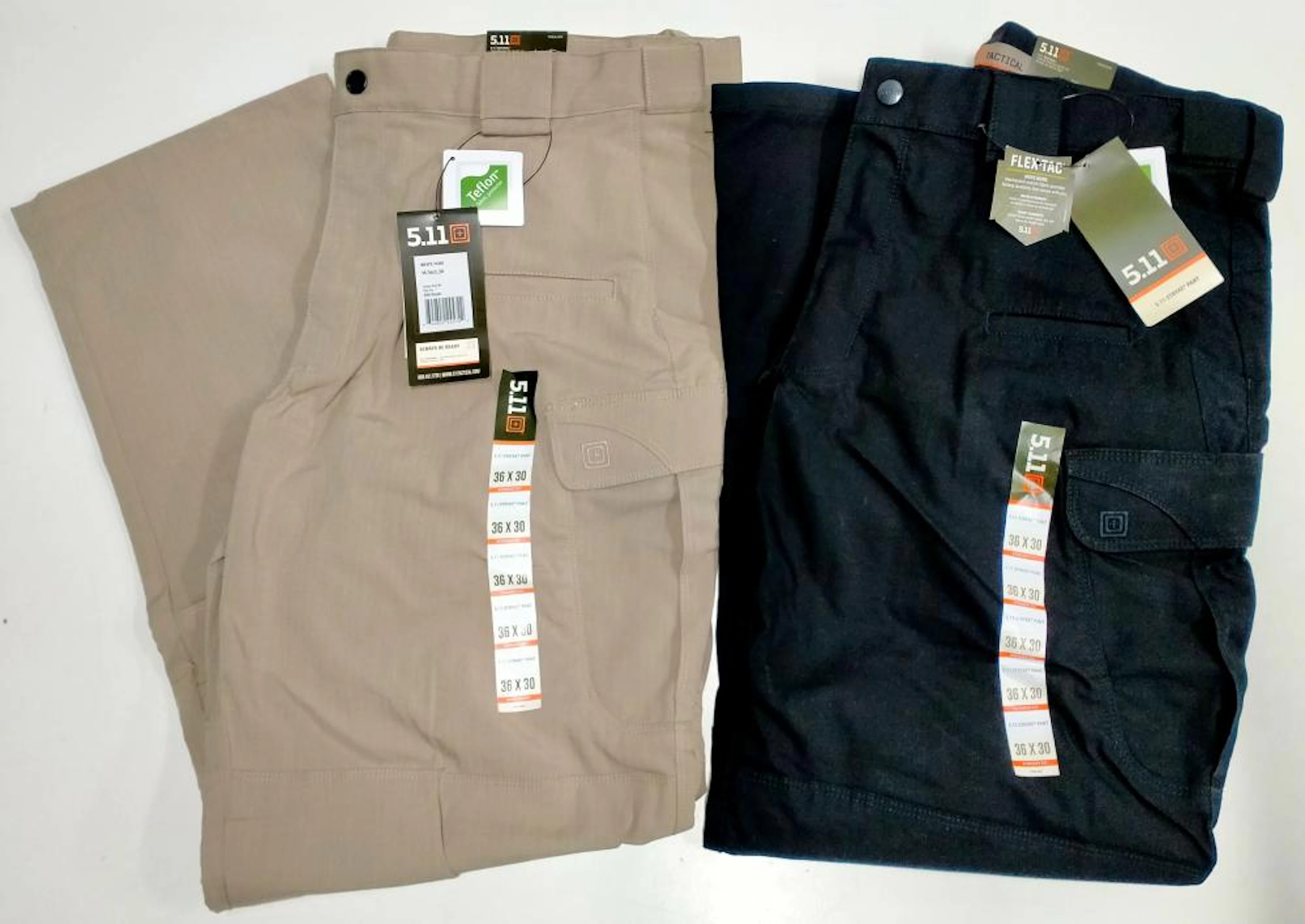 Two pairs of tactical pants marked 5.11