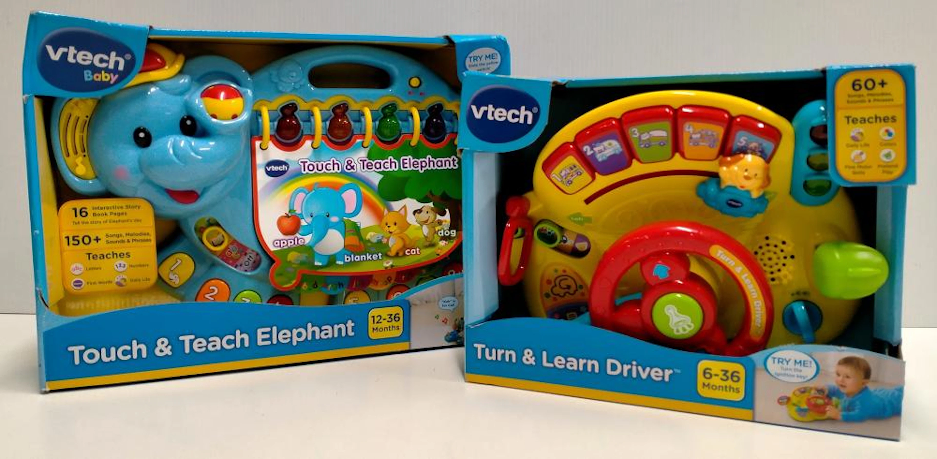 Two baby educational toys marked Vtech