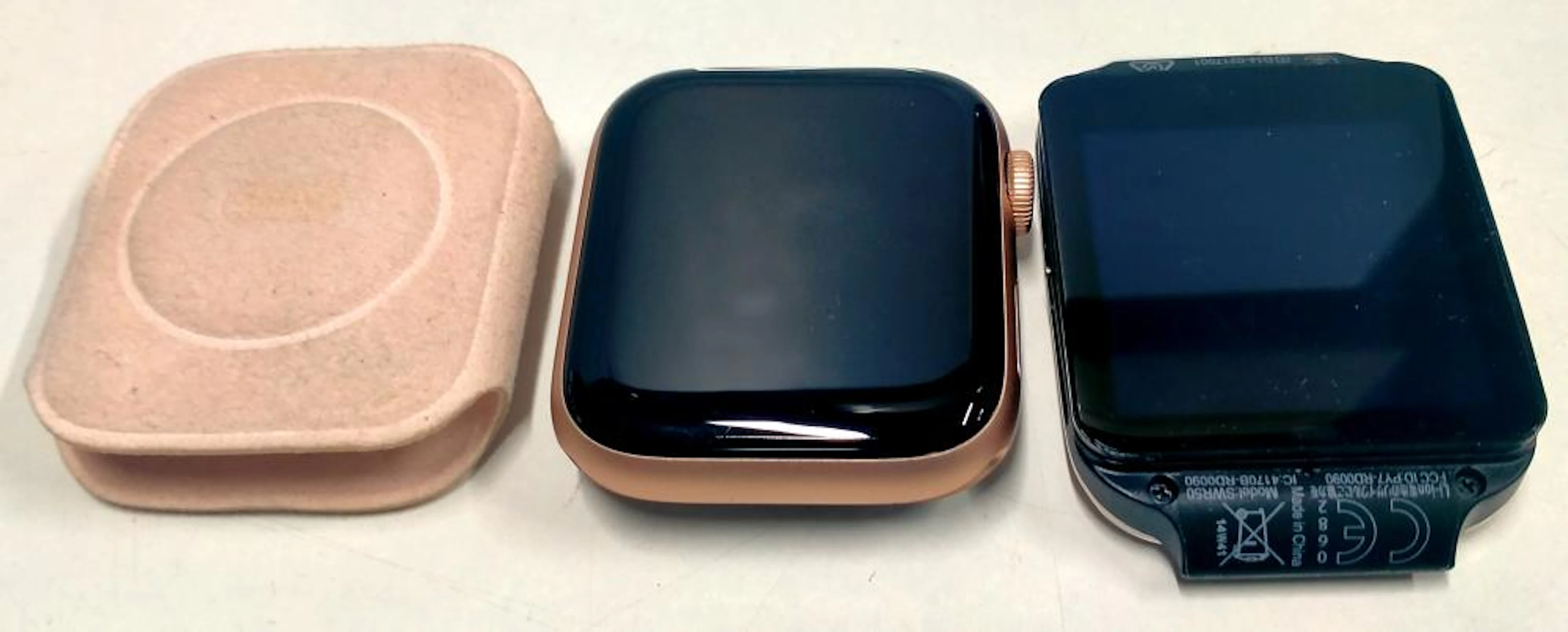 Two smart watch faces marked Apple & Sony