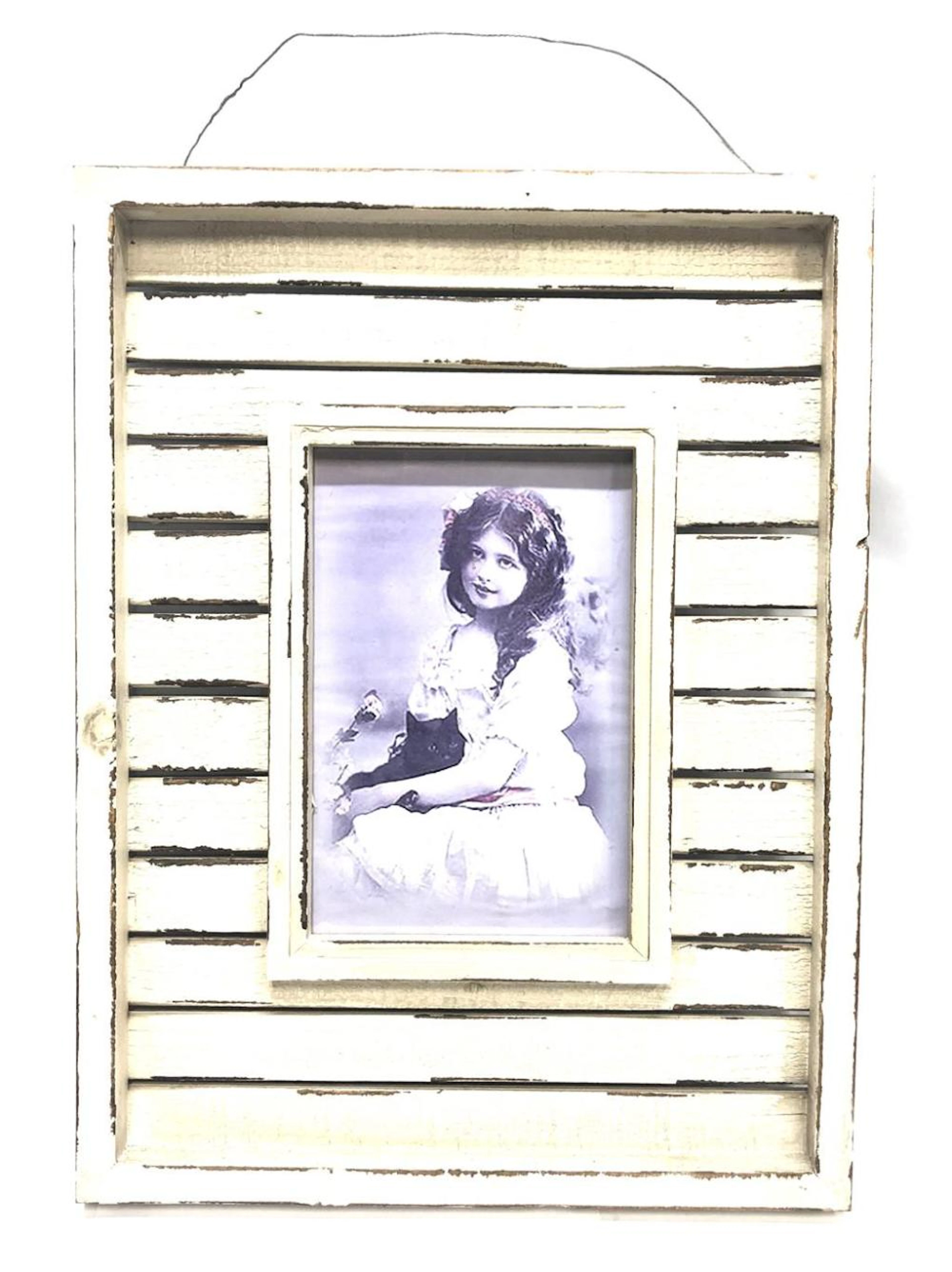 A Shabby-Chic Timber Frame with a Printed Photograph of a Young Girl
