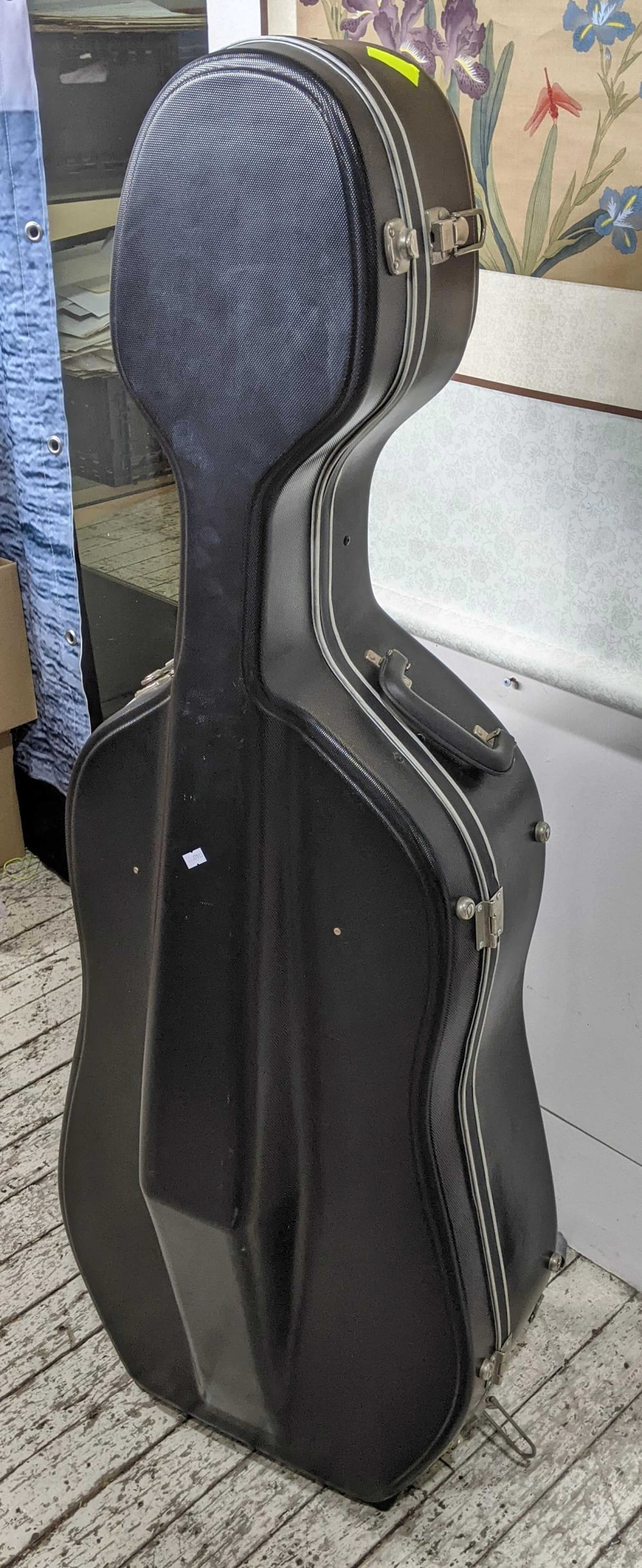 A Hard Cello Travel Case with Key