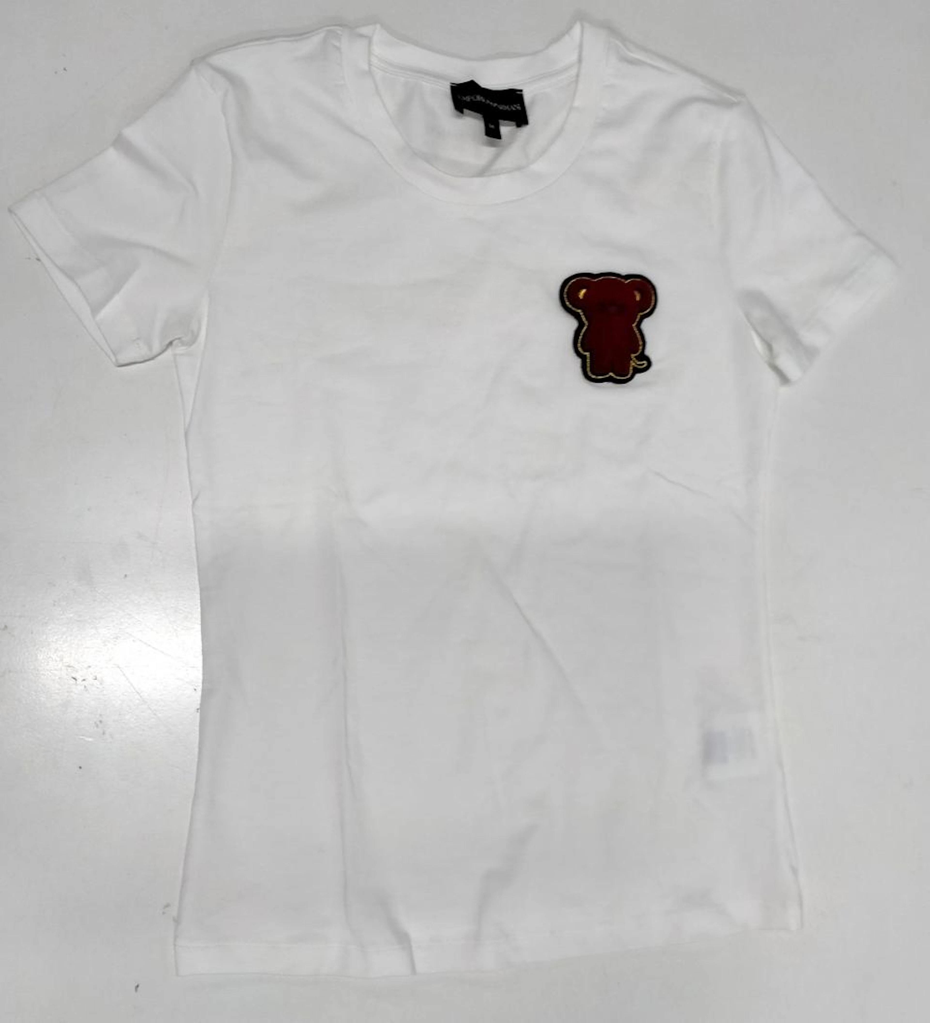 A youth t-shirt marked Emporio Armani size 36, no swing tags