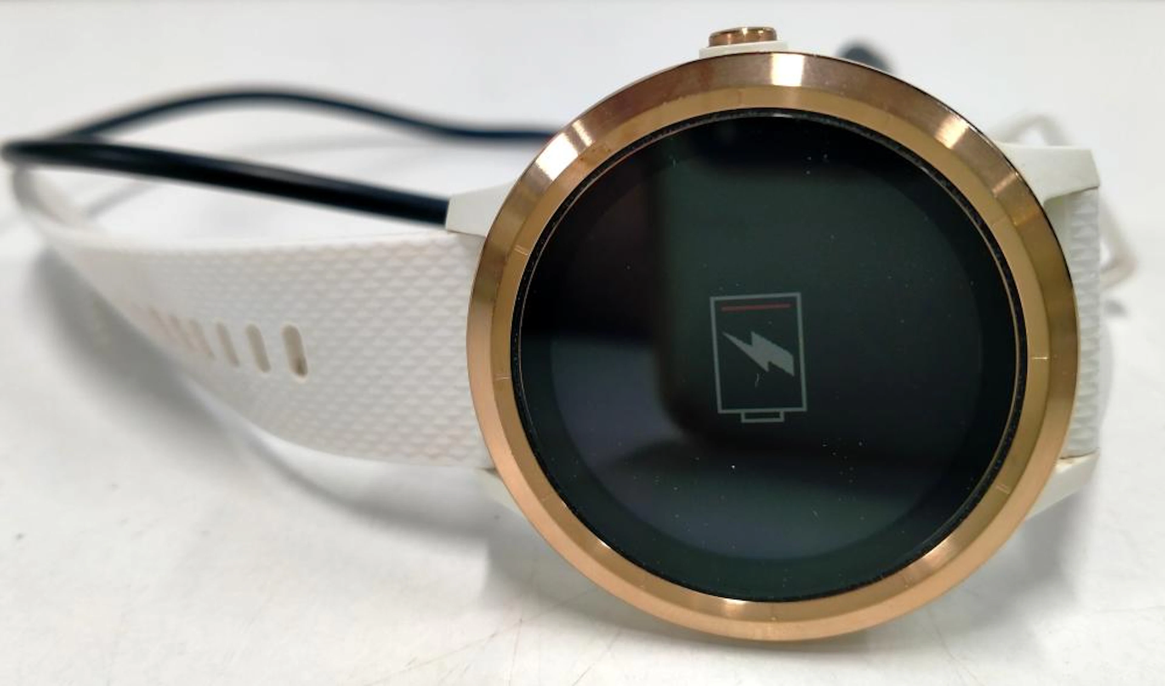 A 2nd hand smart watch marked Garmin vivoactive 3