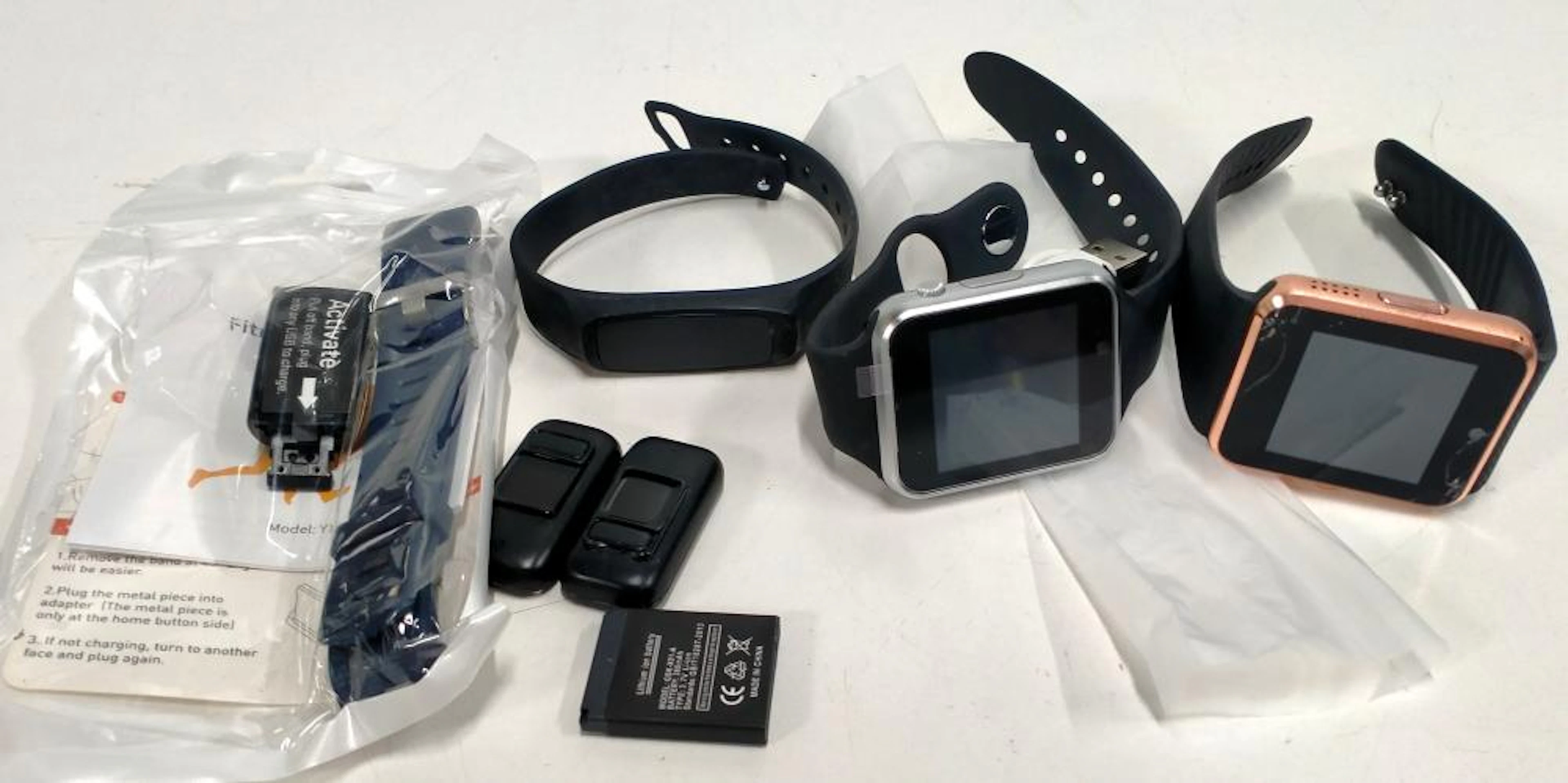 A bag of assorted smart watches etc.