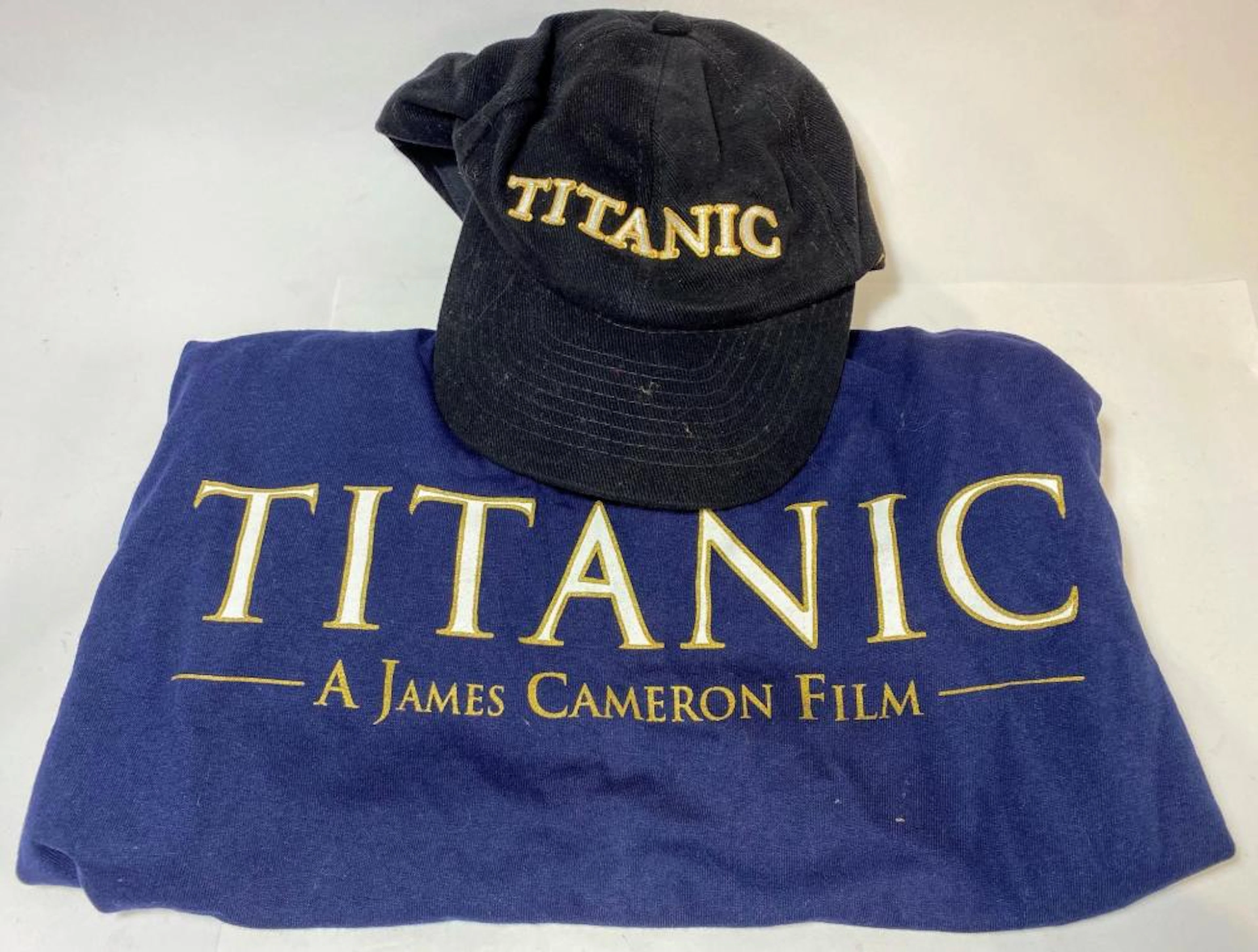 A Collection of Original Promotional Apparel Including...