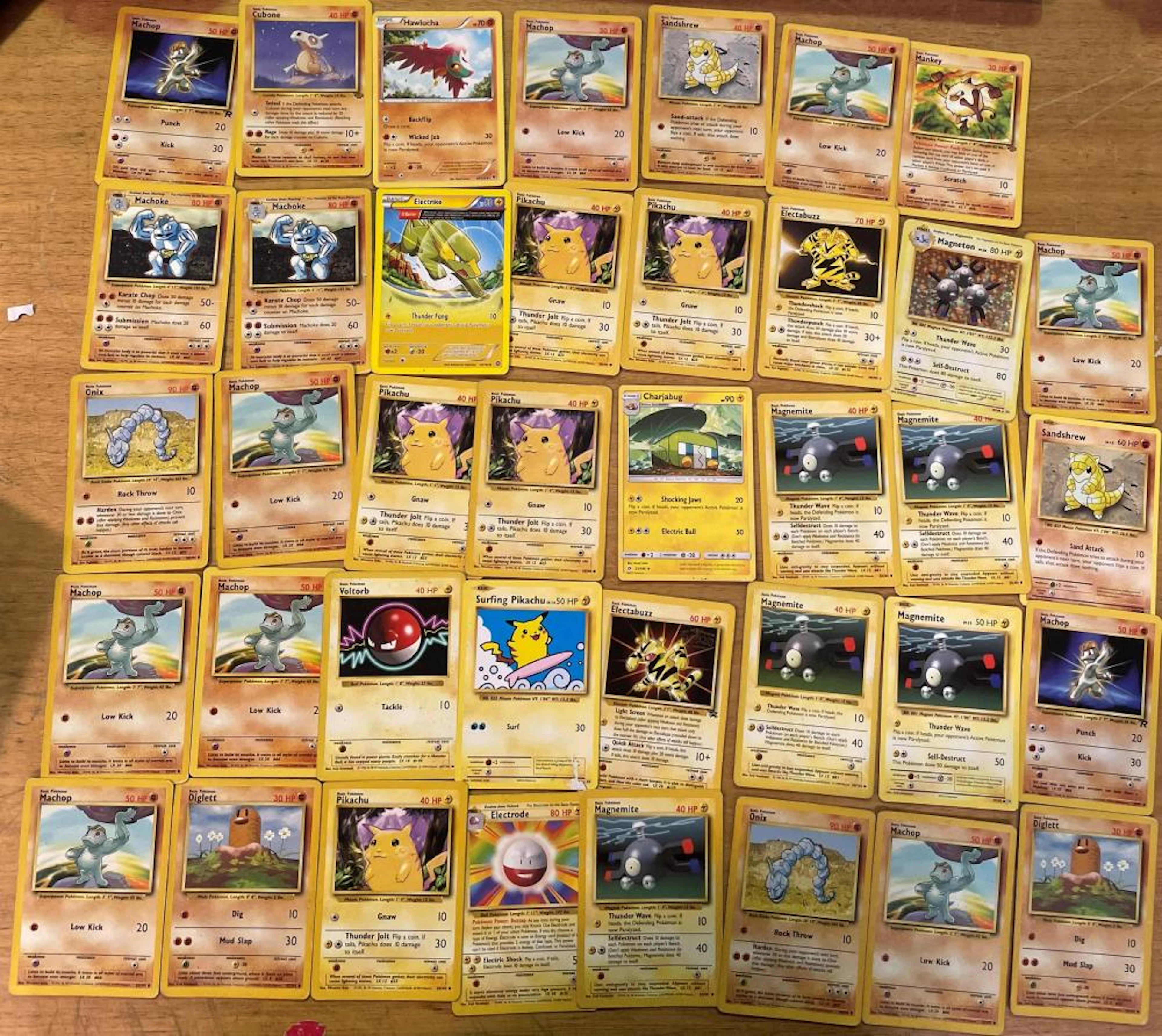 A Collection of Pokemon Cards including a Pikachu Card