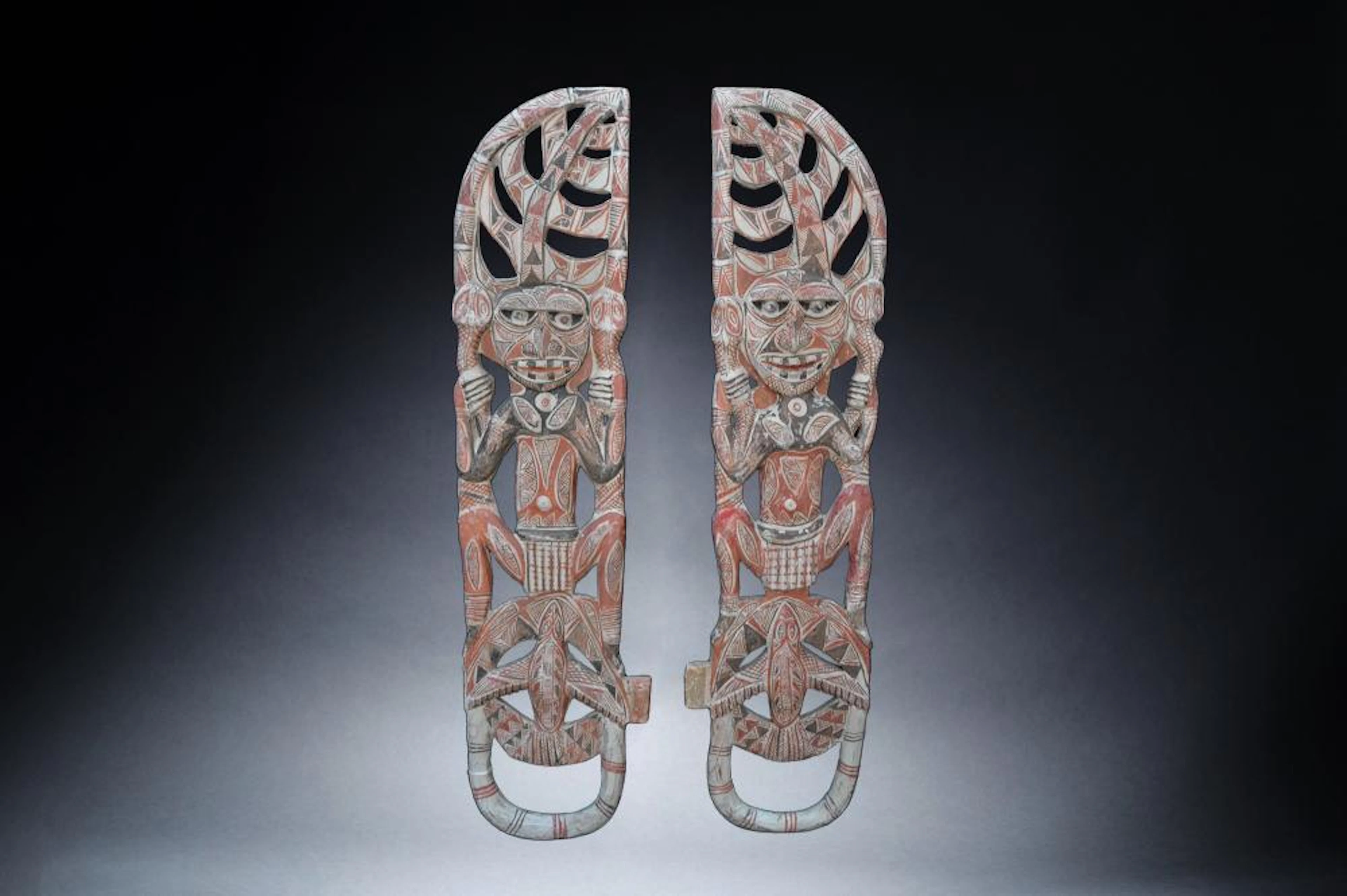 A Finely Carved and Painted Pair of Malangan Mask Ears