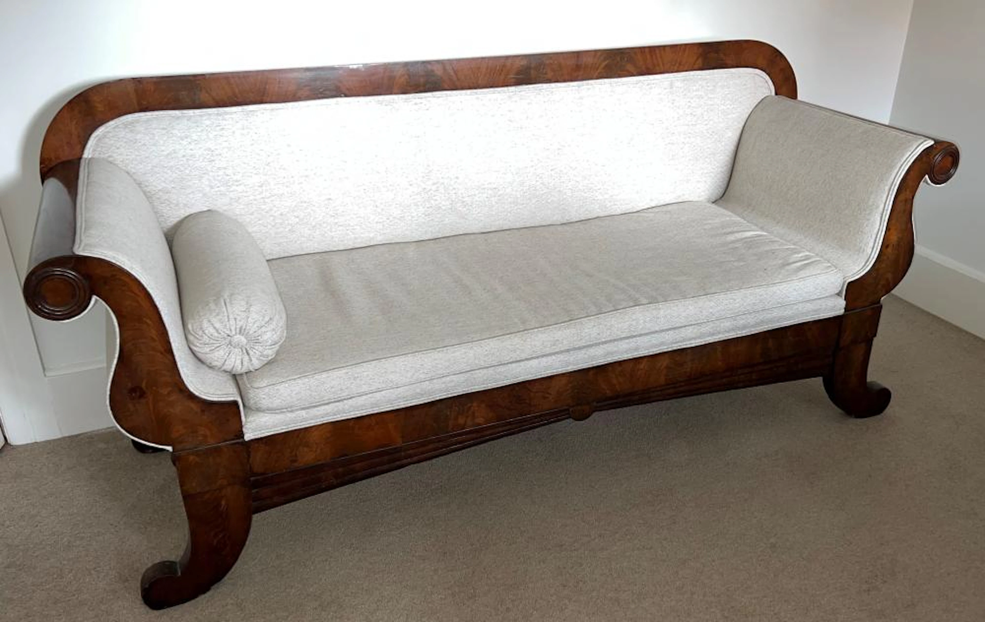 A 19th Century Biedermeier Sofa, with bolster cushio