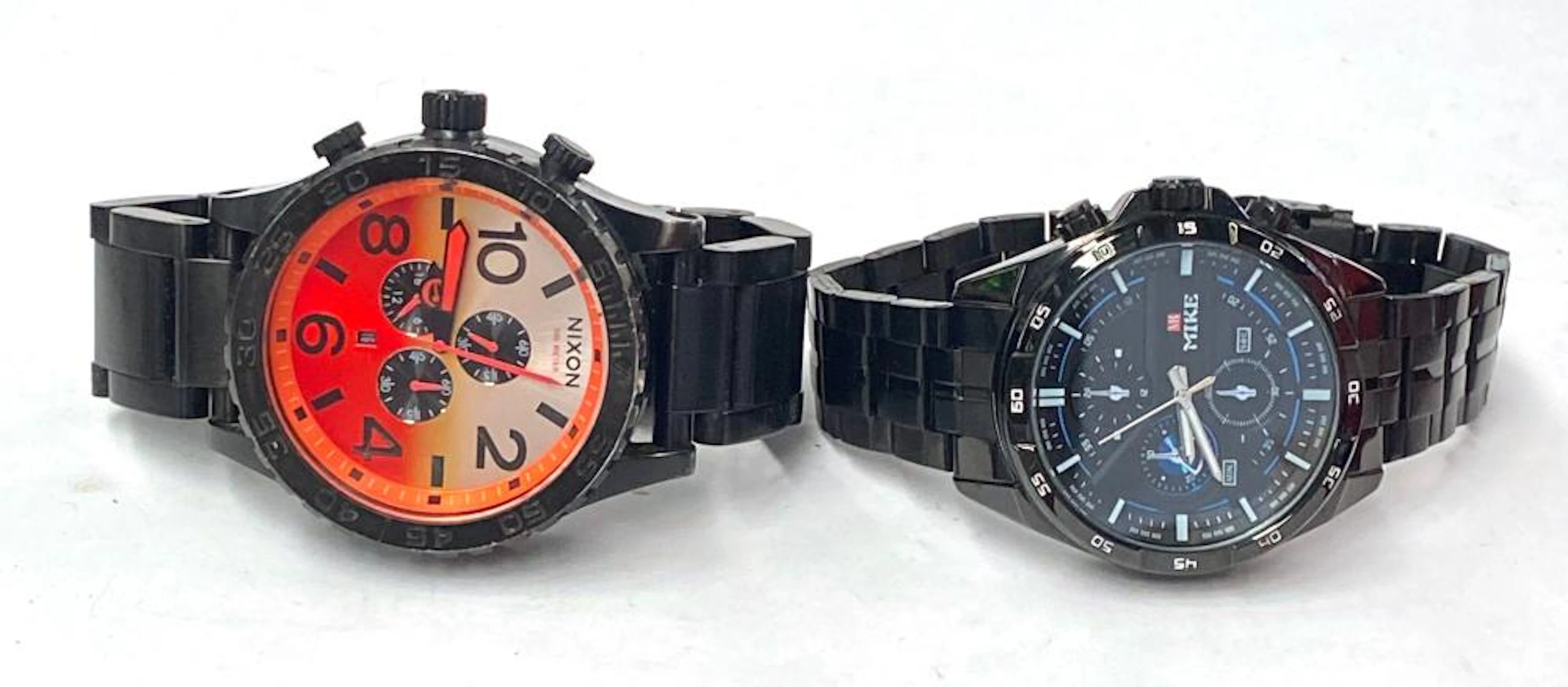 Two Gentleman's Wrist Watched marked Nixon, Mike