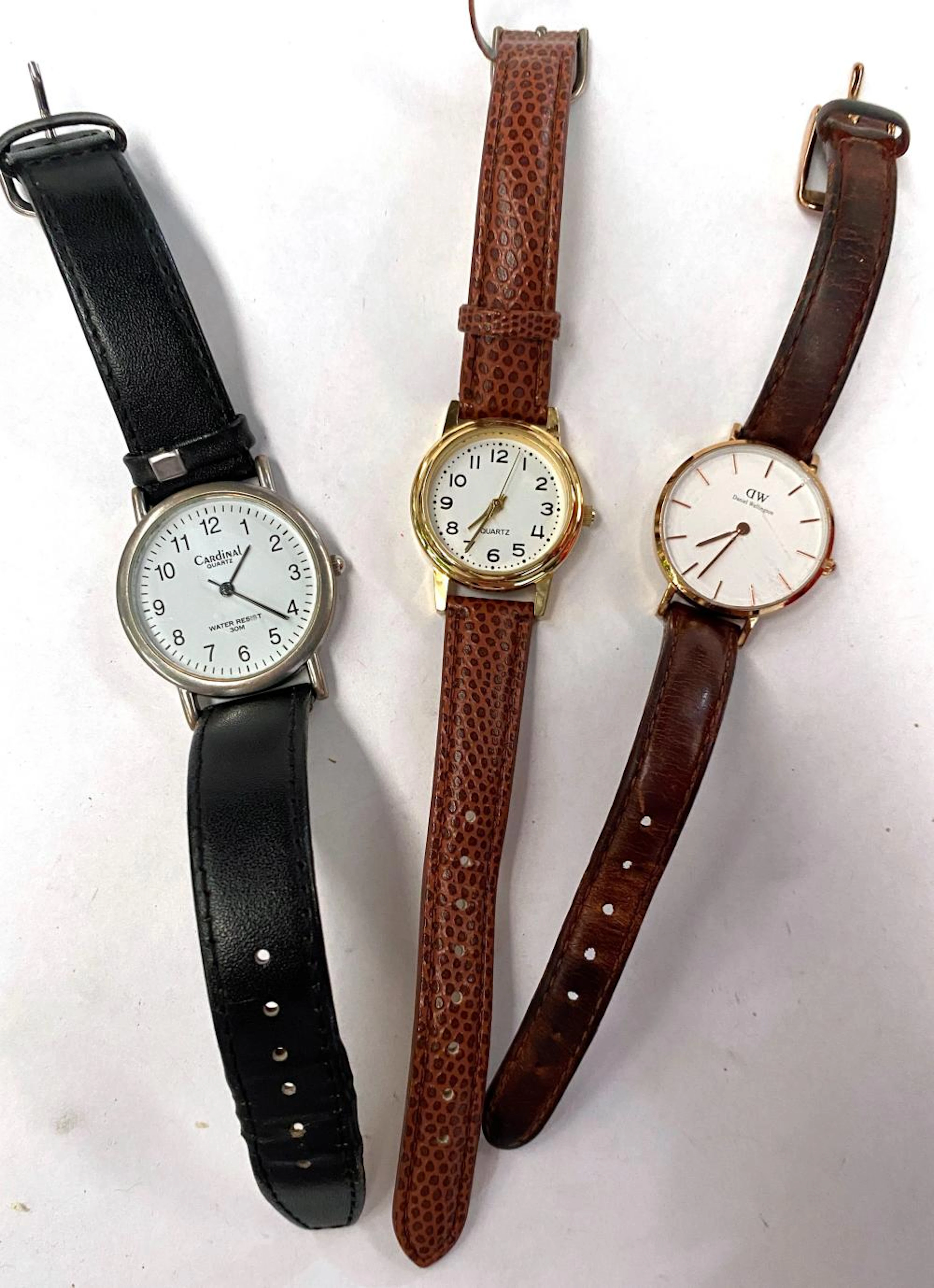 Three Wrist Watches marked Daniel Wellington, Cardinal