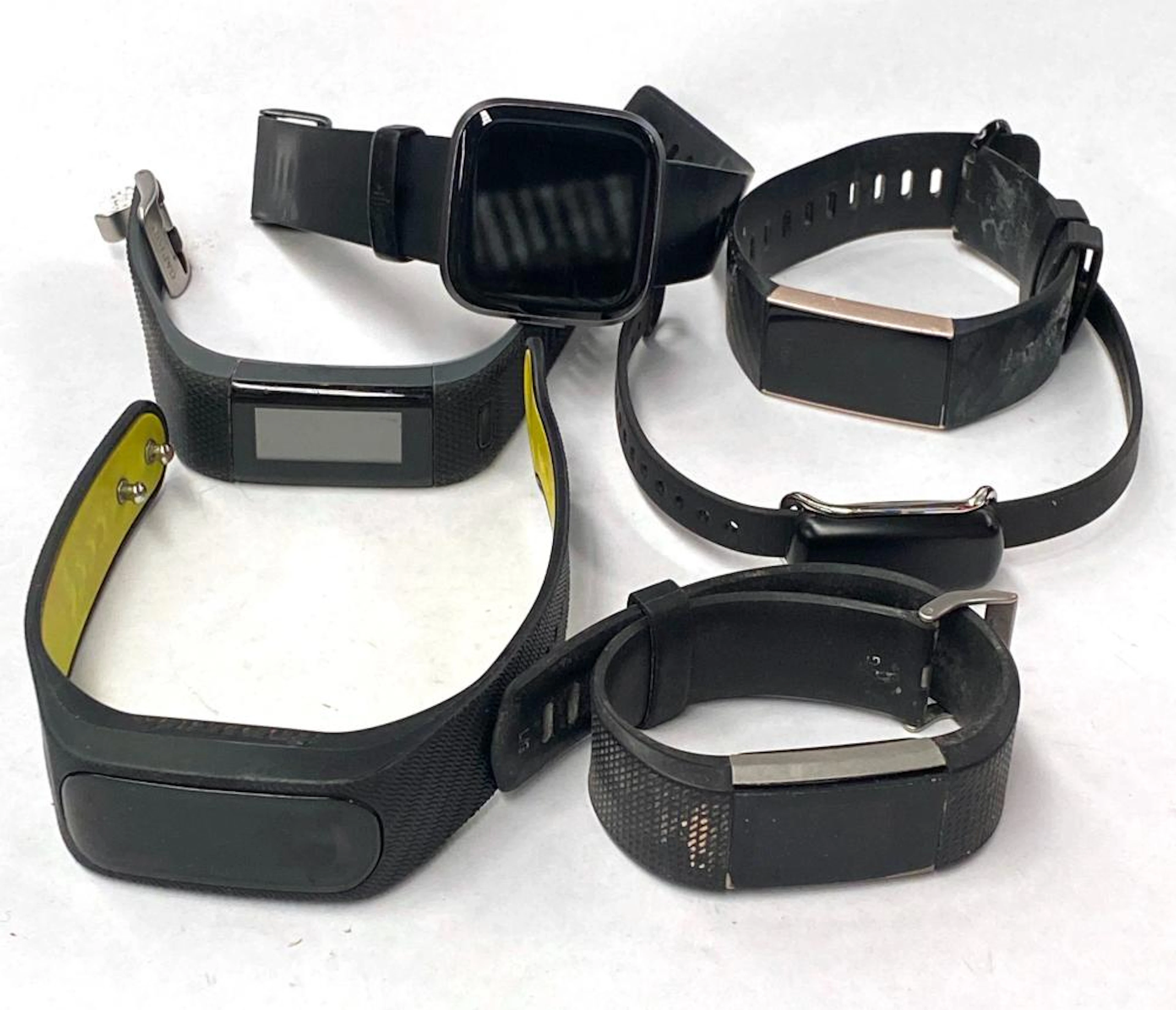Six Fitbit/Smart Watches