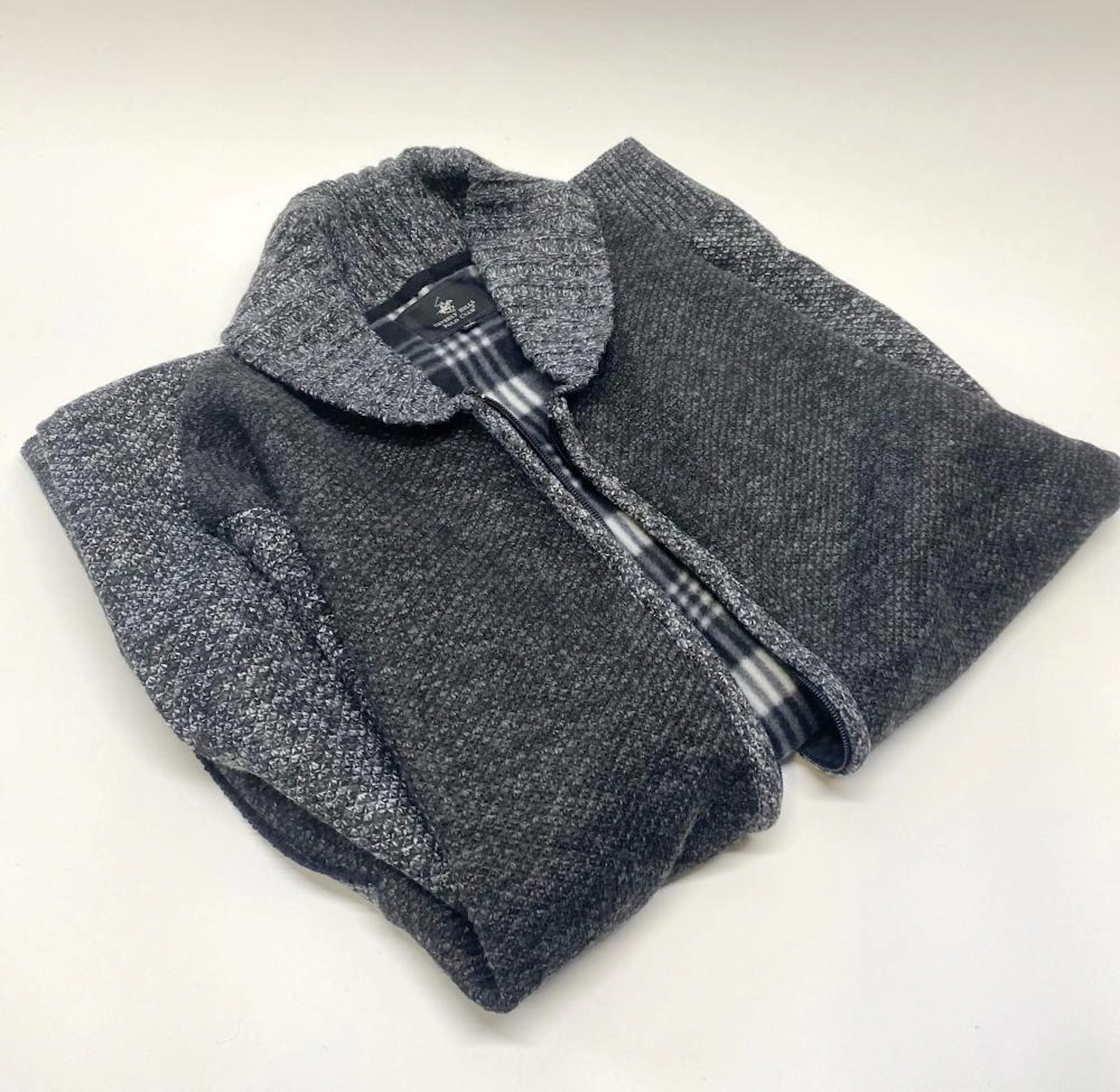 A jacket marked Beverly Hills Polo Club size 110