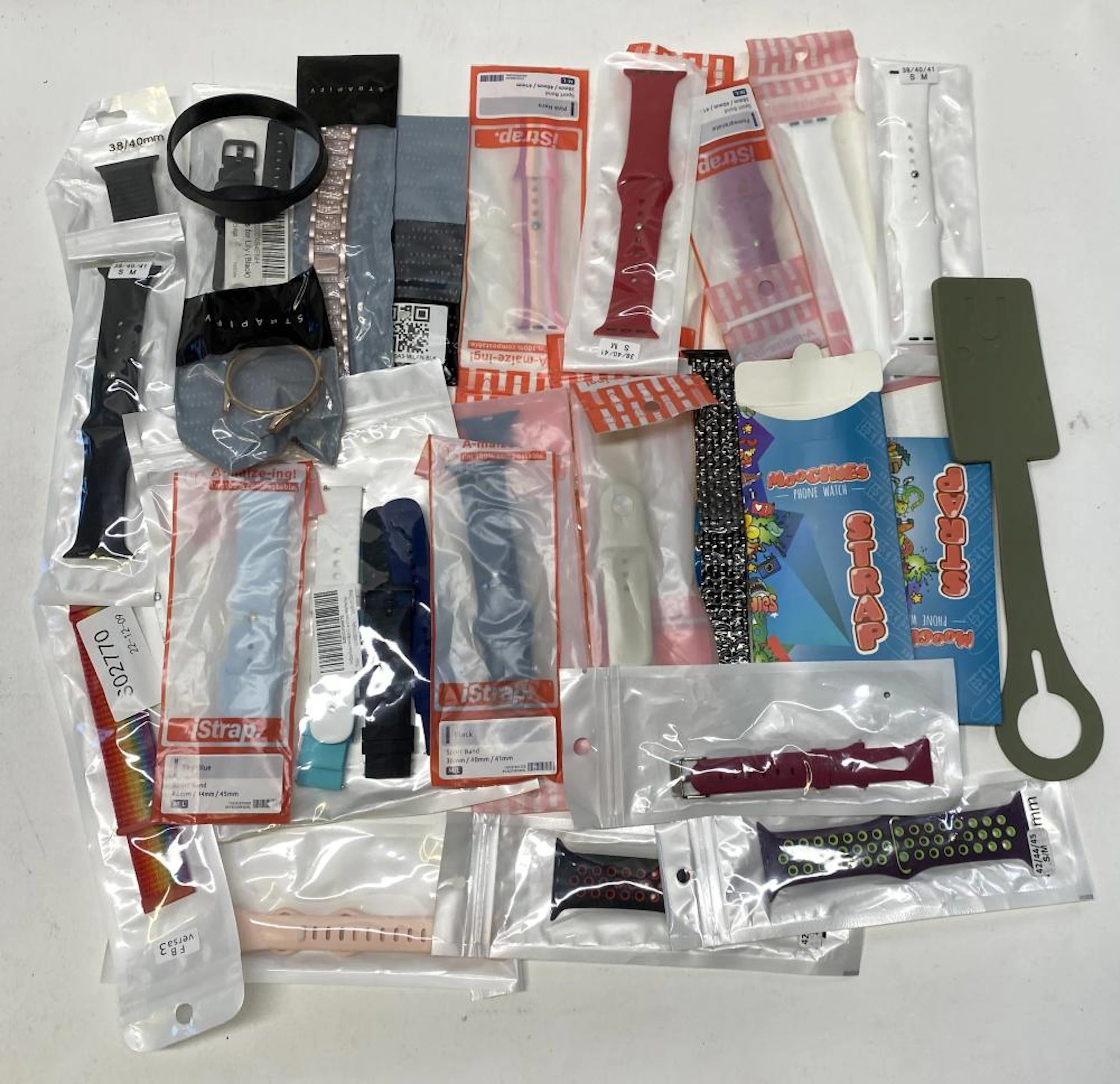 A group of smart watch accessories etc.