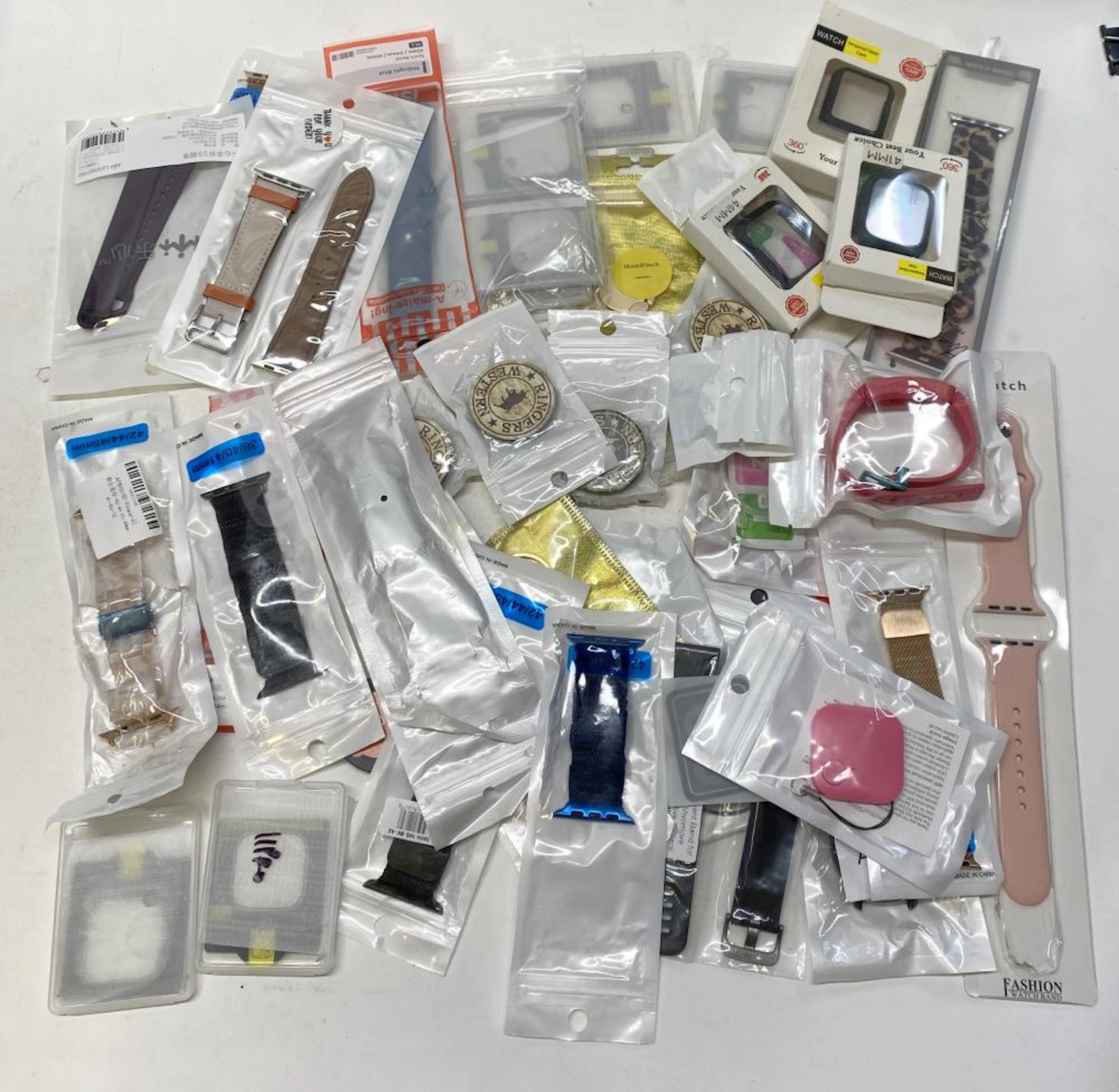 A group of smart watch accessories etc.