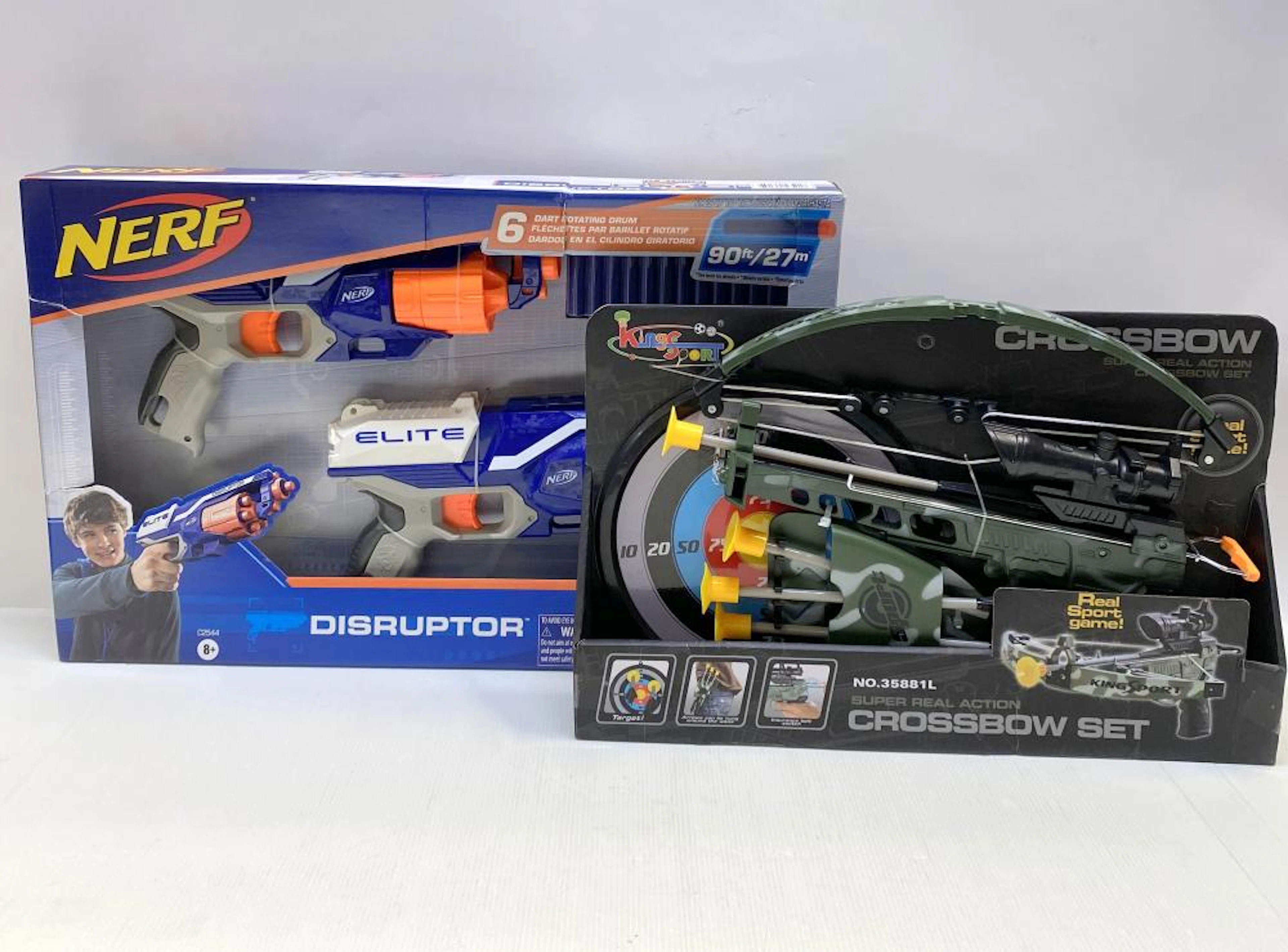 A group of toy weapons marked Nerf etc.