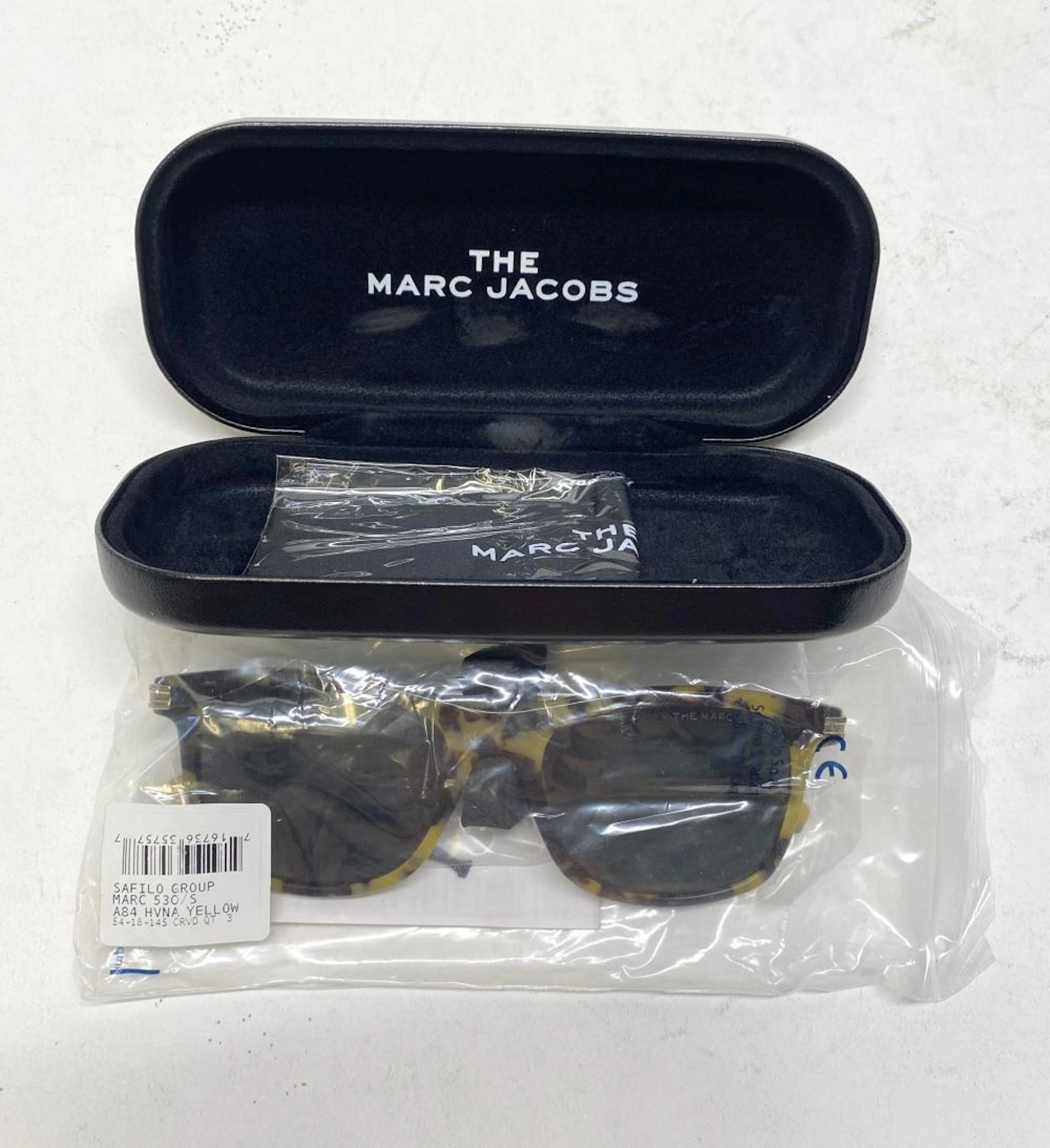 A pair of sunglasses marked The Marc Jacobs