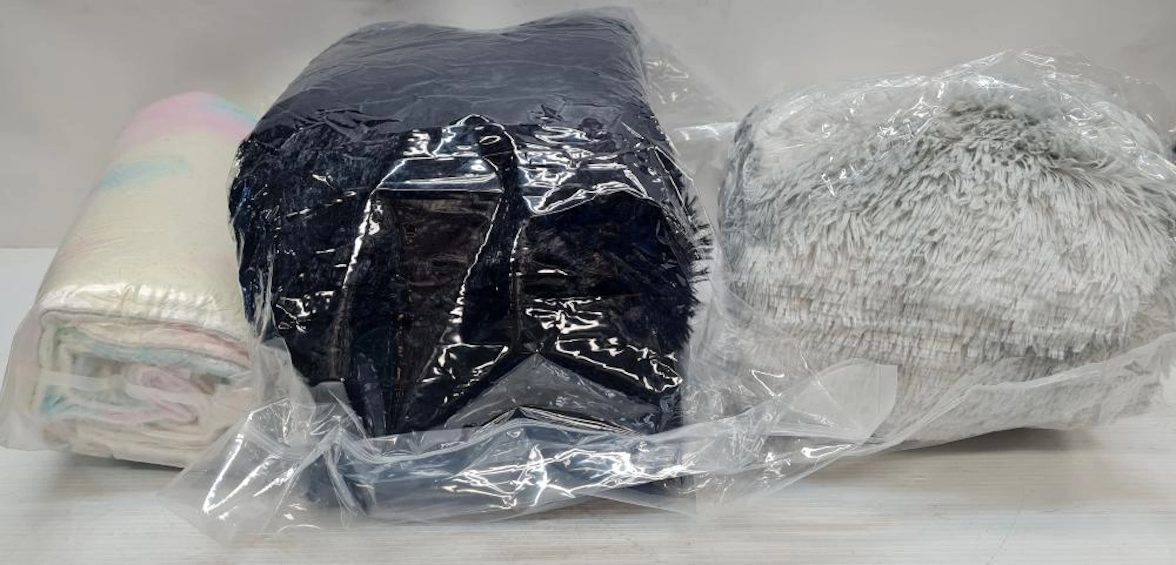 Three plush rugs