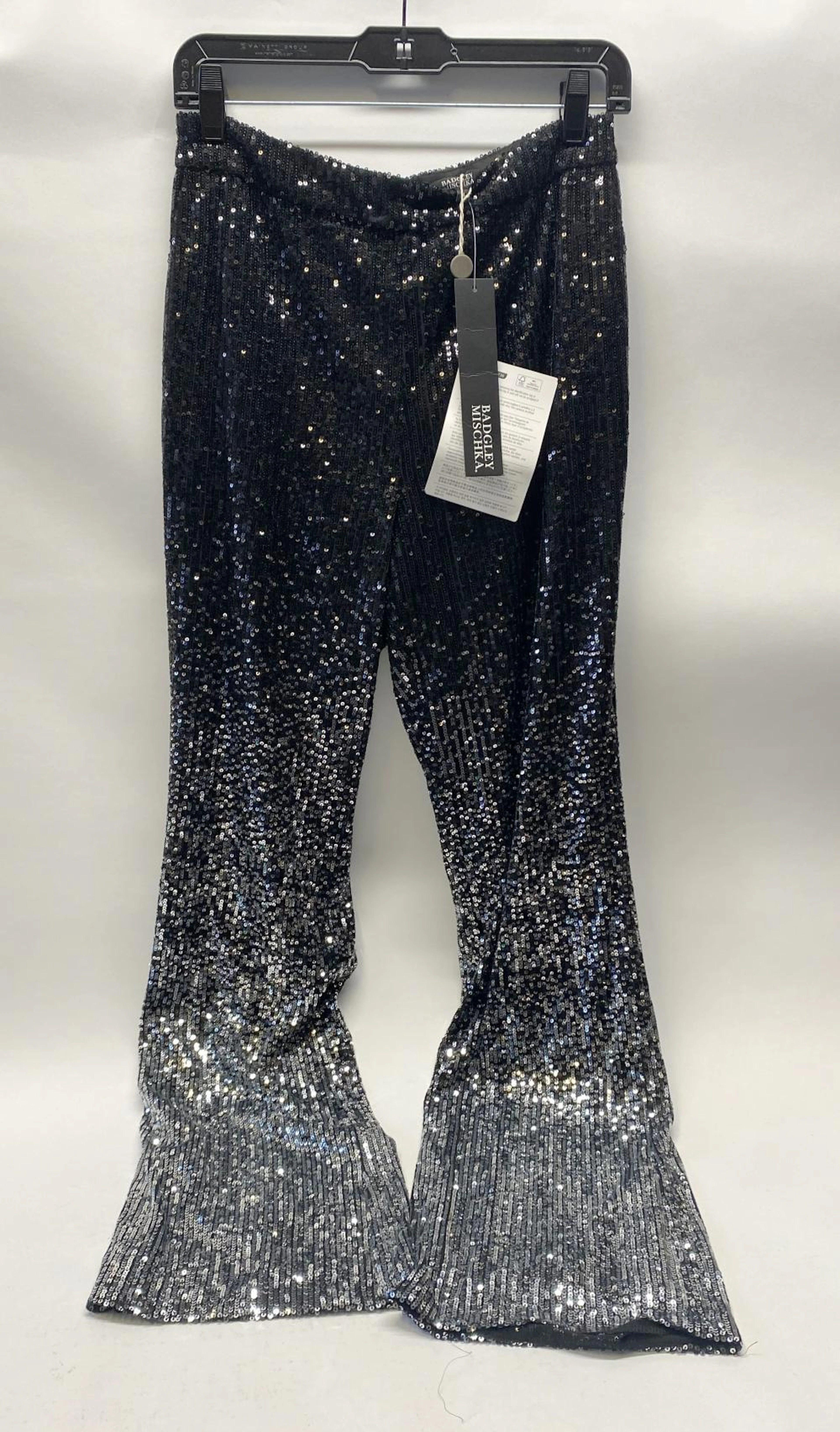 A pair of sequin pants marked Badgley Mischka size 4