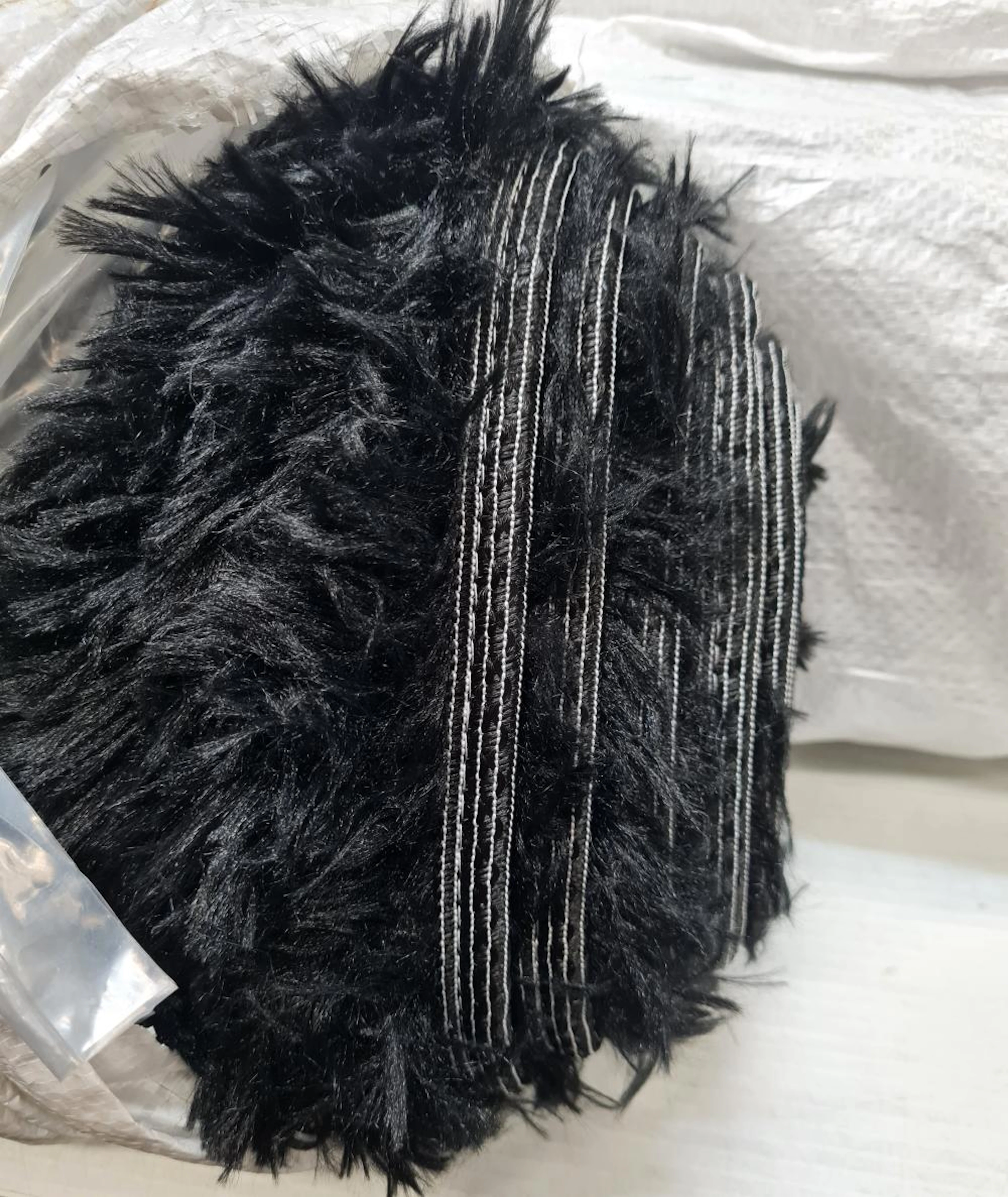 Three 200cm long plush rugs