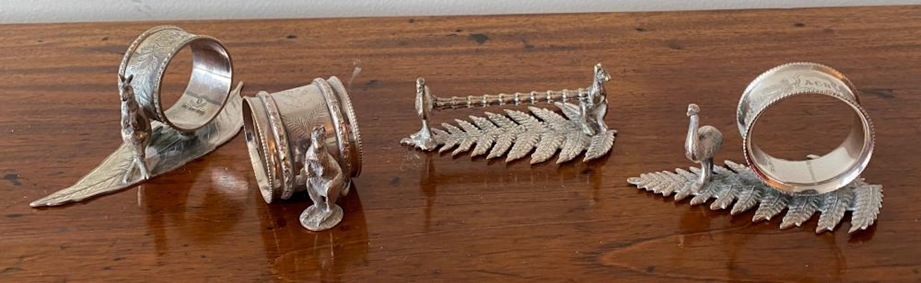 Four Silver Plate Australian Napkin Rings & Knife Rest