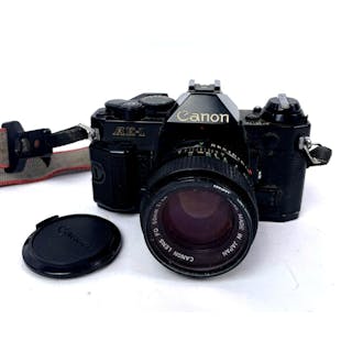 A Vintage Canon AE-1 Black FD 50mm f/1.8 S.C. SC Lens 35mm Film Camera