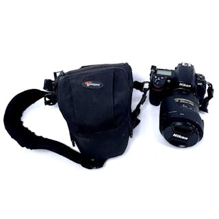A Nikon D700 Digital Camera with AF-S Nikkor 28-300mm F3.5-5.6 G VR AF Zoom Lens