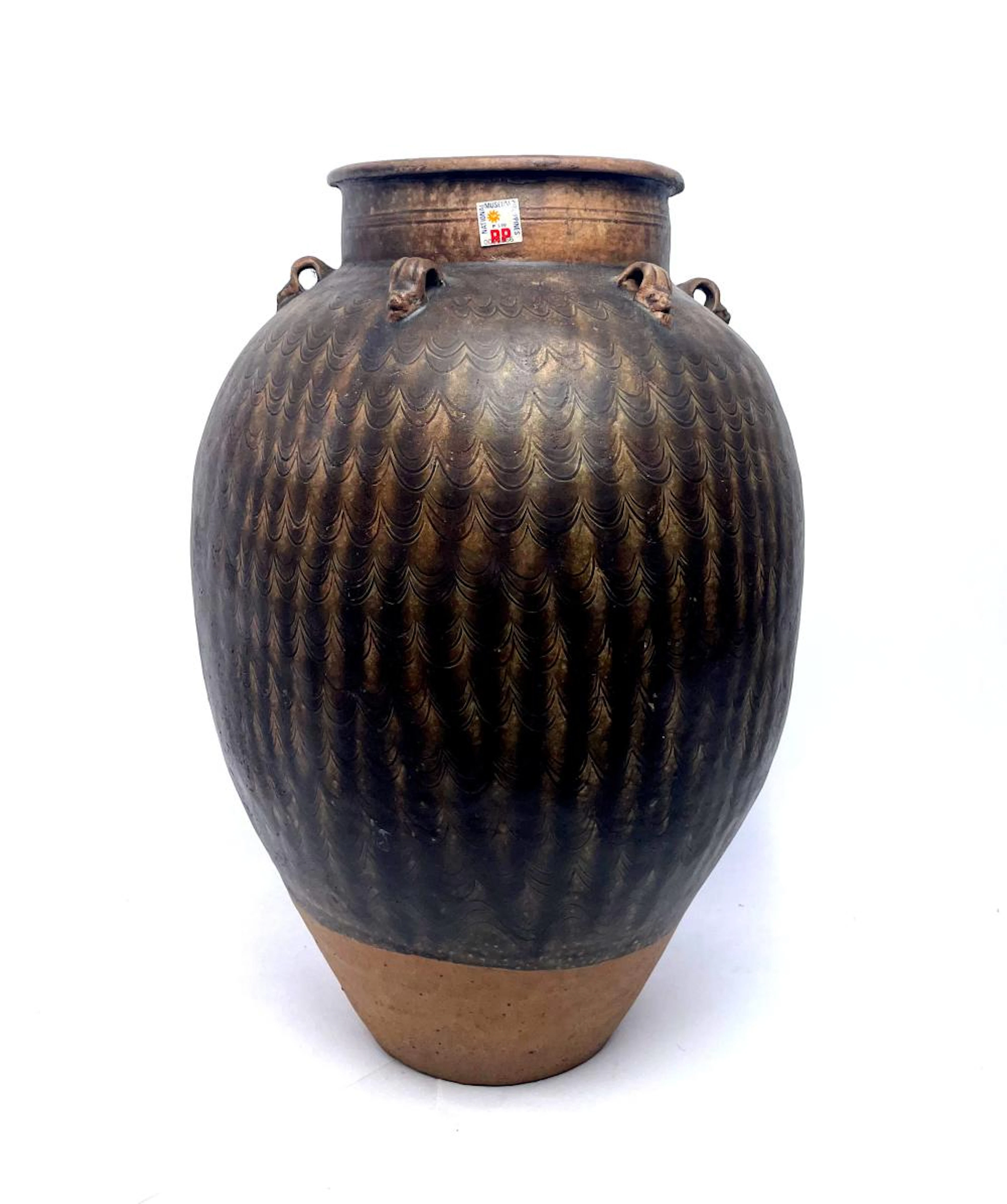 A Large Brown Glaze Stoneware Ovid Jar with Six Vertical...