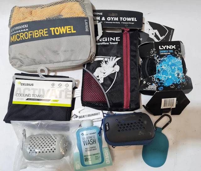 A number of sports towels & accessories