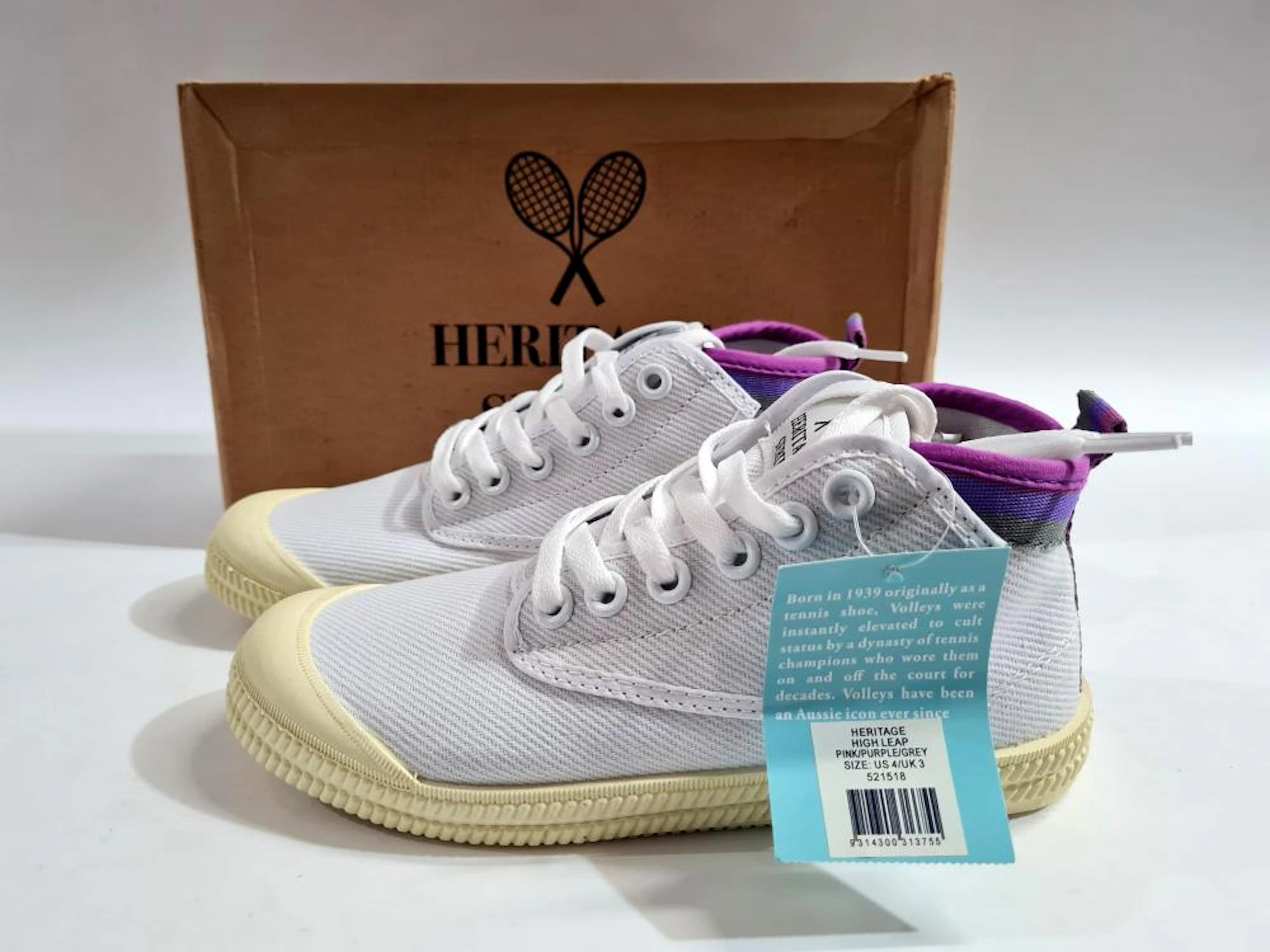 A pair of sneakers marked VOLLEY HERITAGE HIGHLEAP size 4US/37EU