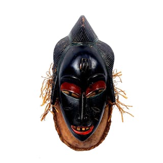 A Vintage African Dan Mask with Polychrome & Raffia Fring Detail, 20th Century