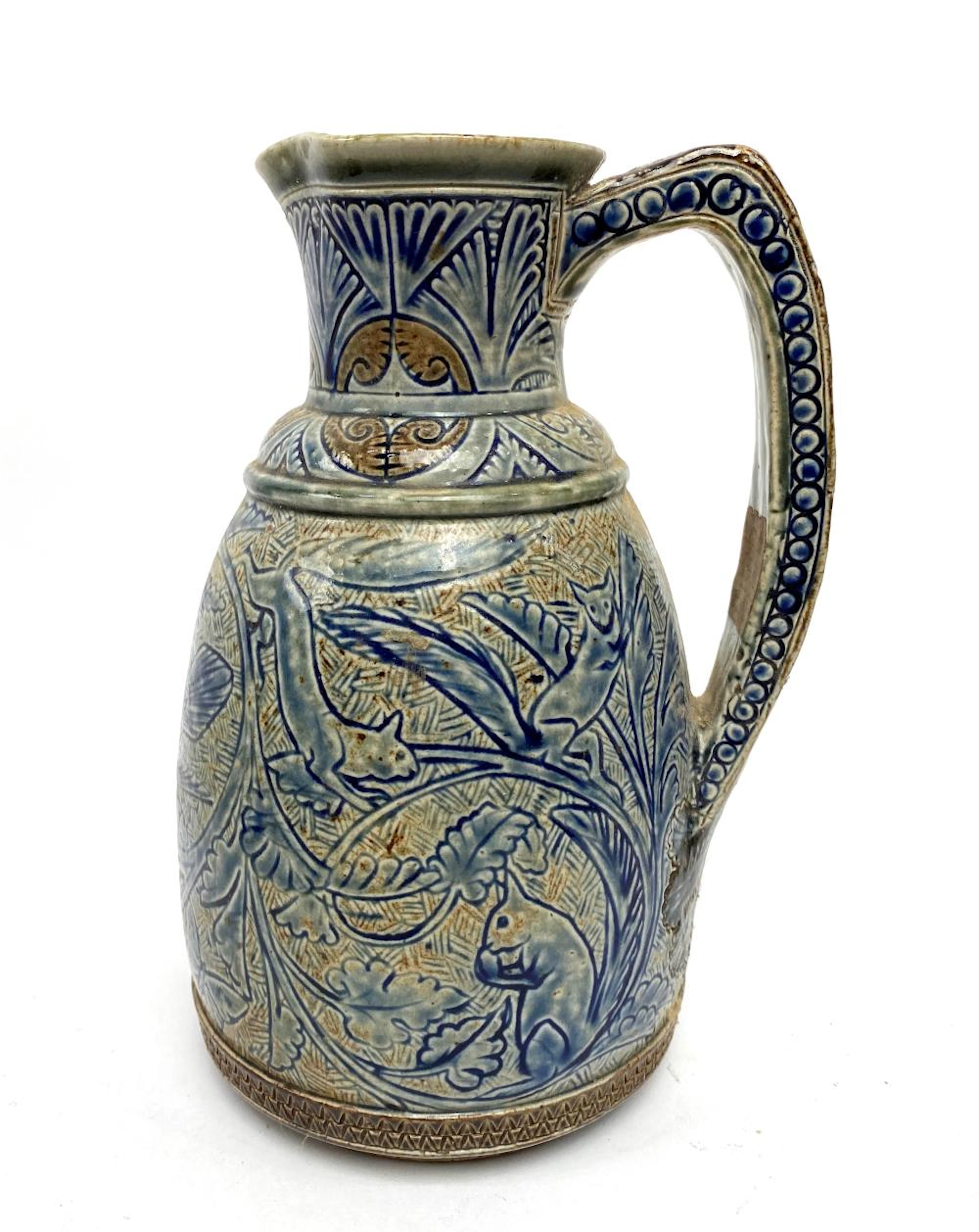 A Martin Brothers Glazed Stoneware Jug with Squirrels, Birds & Cat, 1875