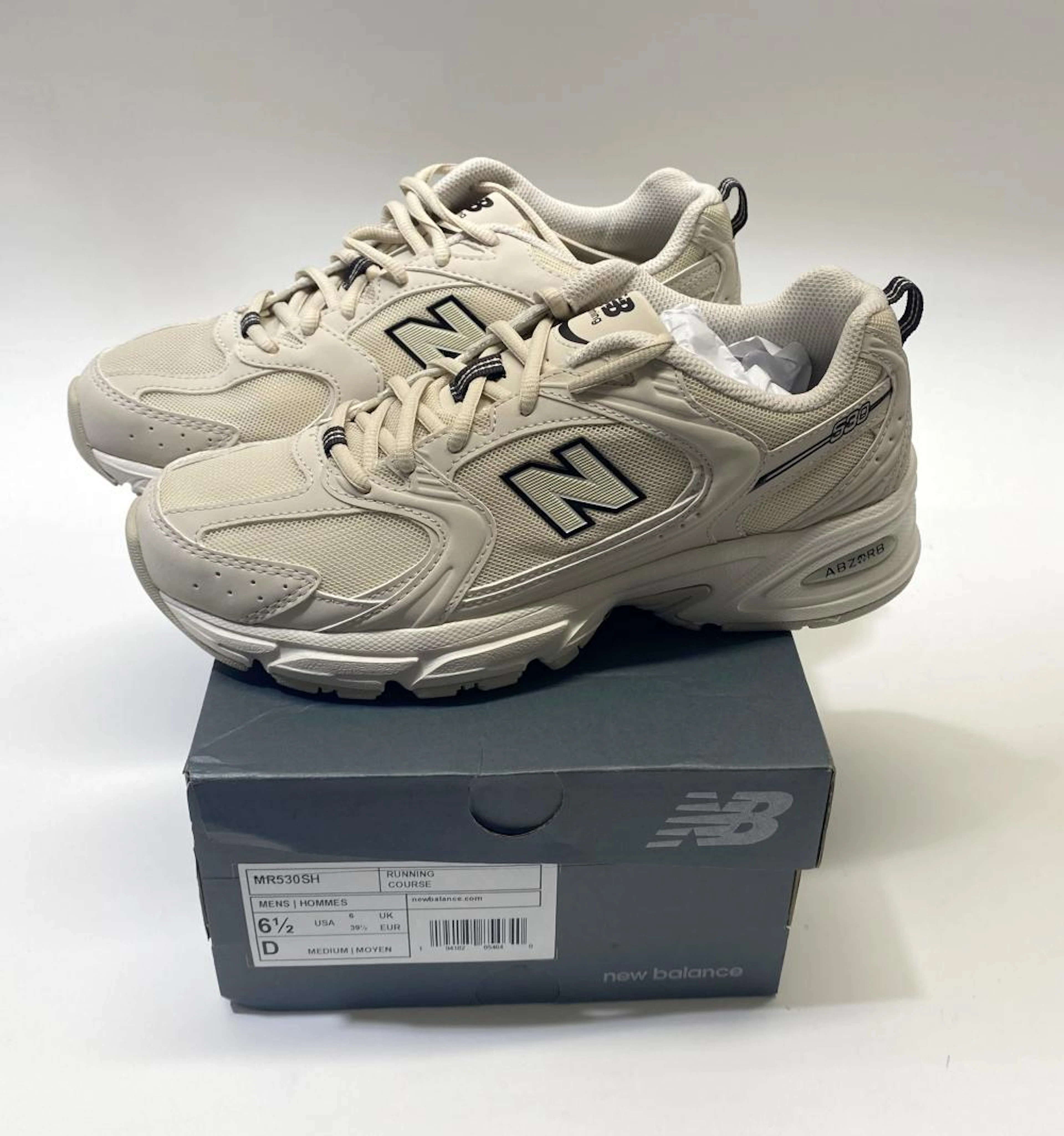A pair of shoes marked New Balance size EU39.5