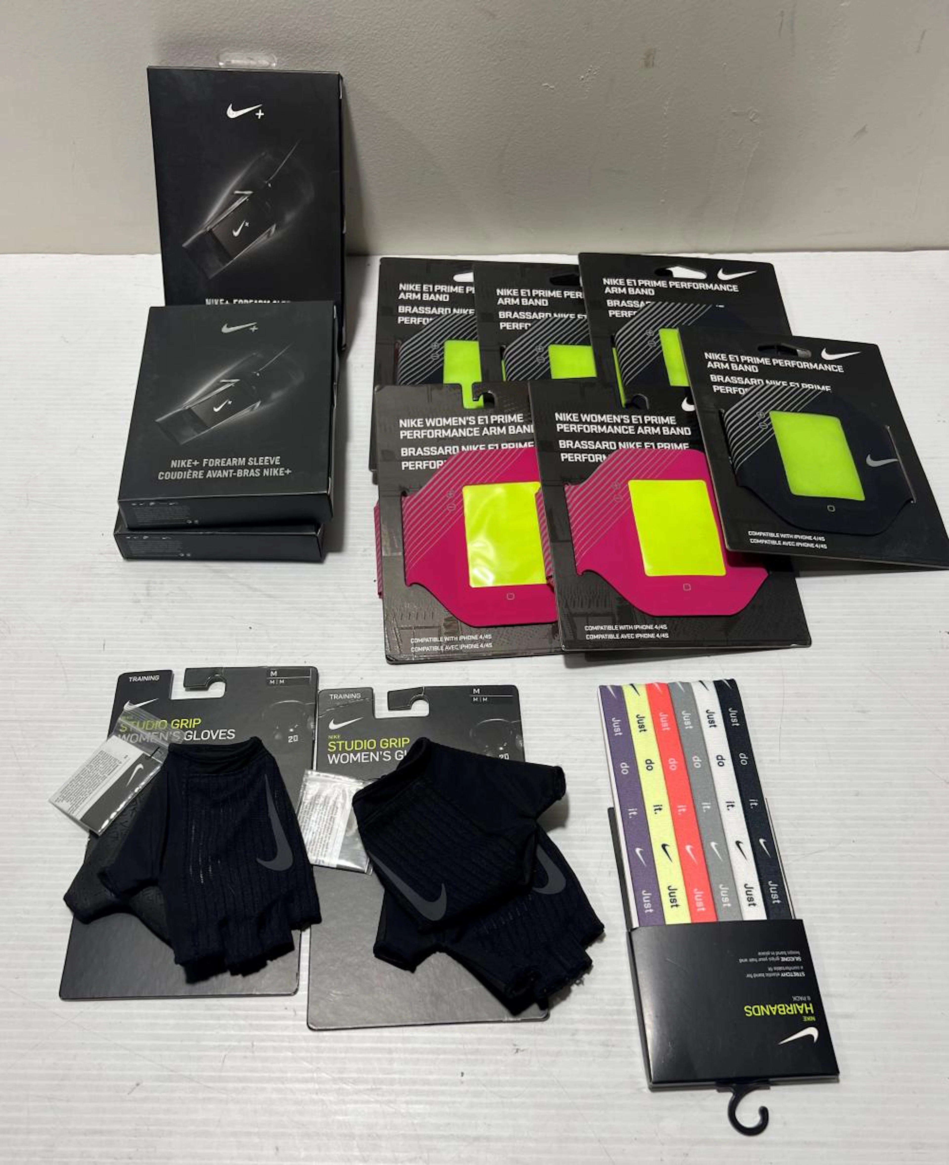 A Collection of Sports Gloves, Laces & Phone Cases marked Nike