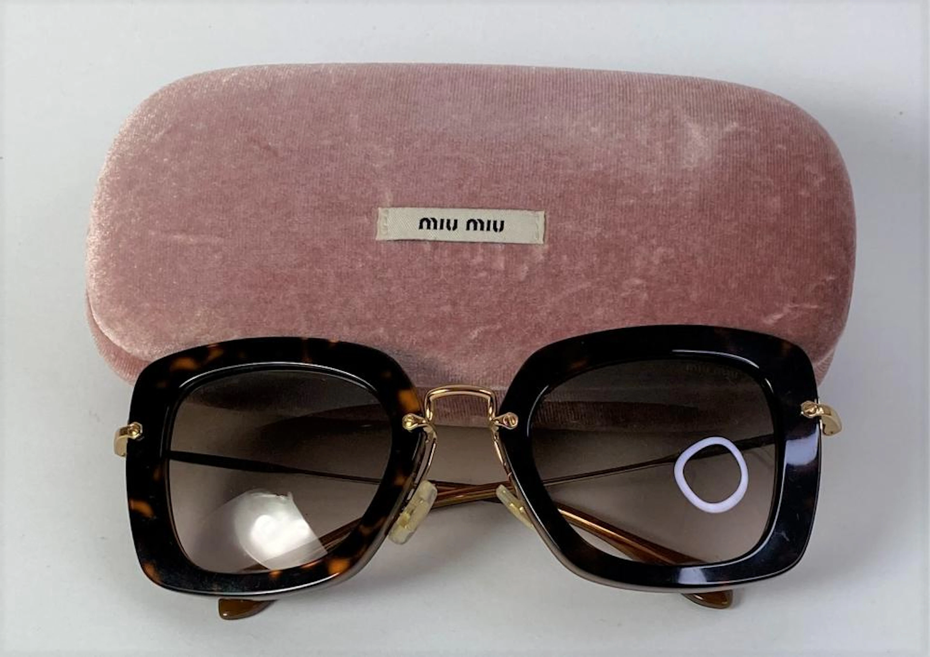 Miu Miu, Italy: Faux Tortoise Shell Cats Eye Sunglasses