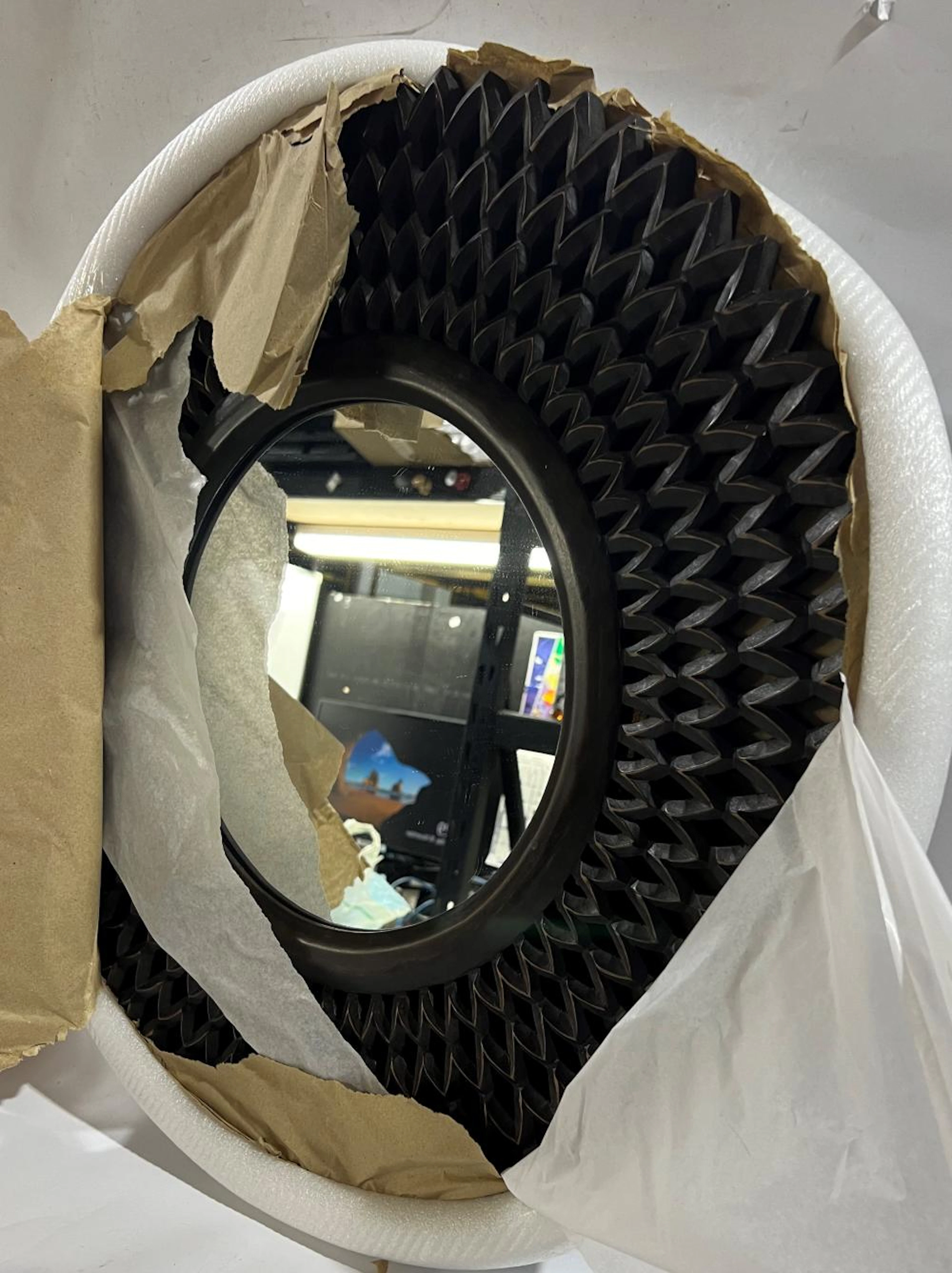 A Carved Timber Circular Mirror dia. 59 cm
