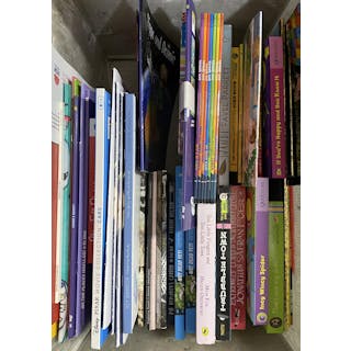 A large group of kids books