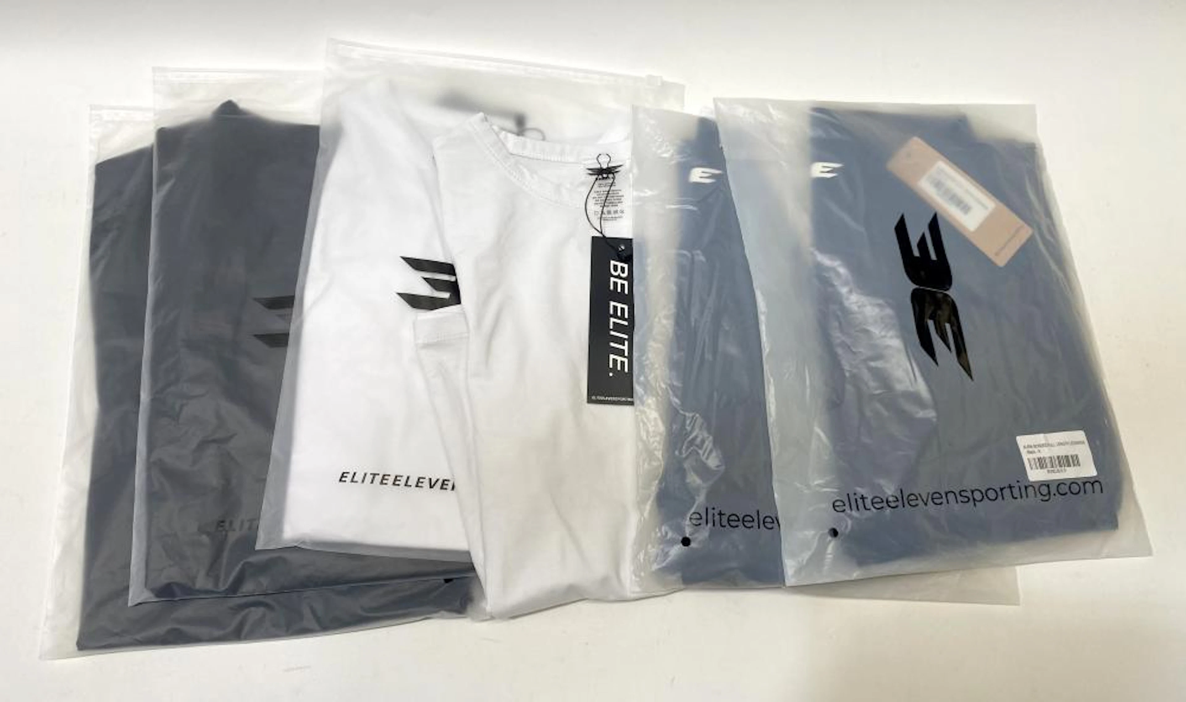 A group of clothing marked Elite Sporting size S