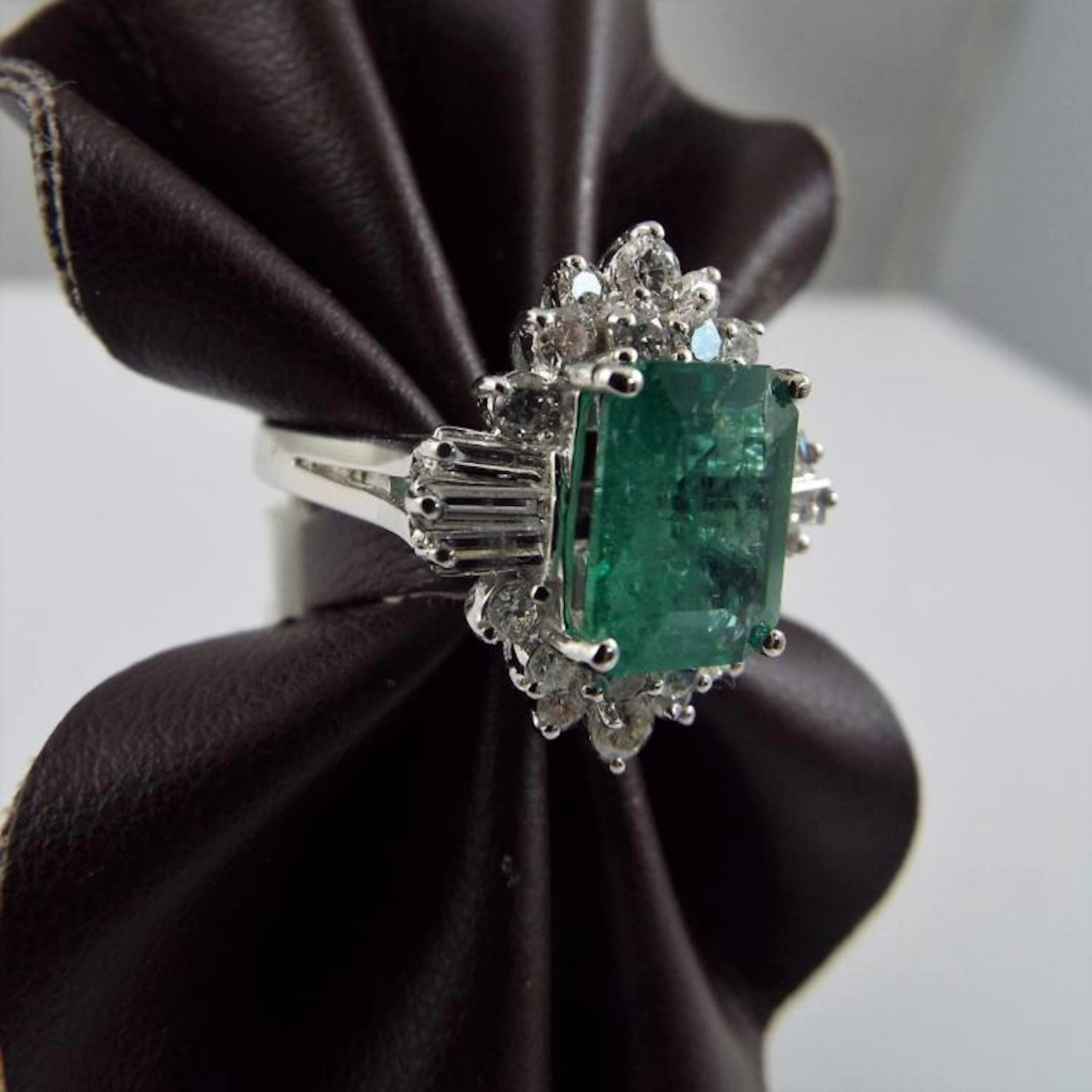 14K Y.G. Ring w/2.55ct Emerald Cut Emerald Surrounded by...