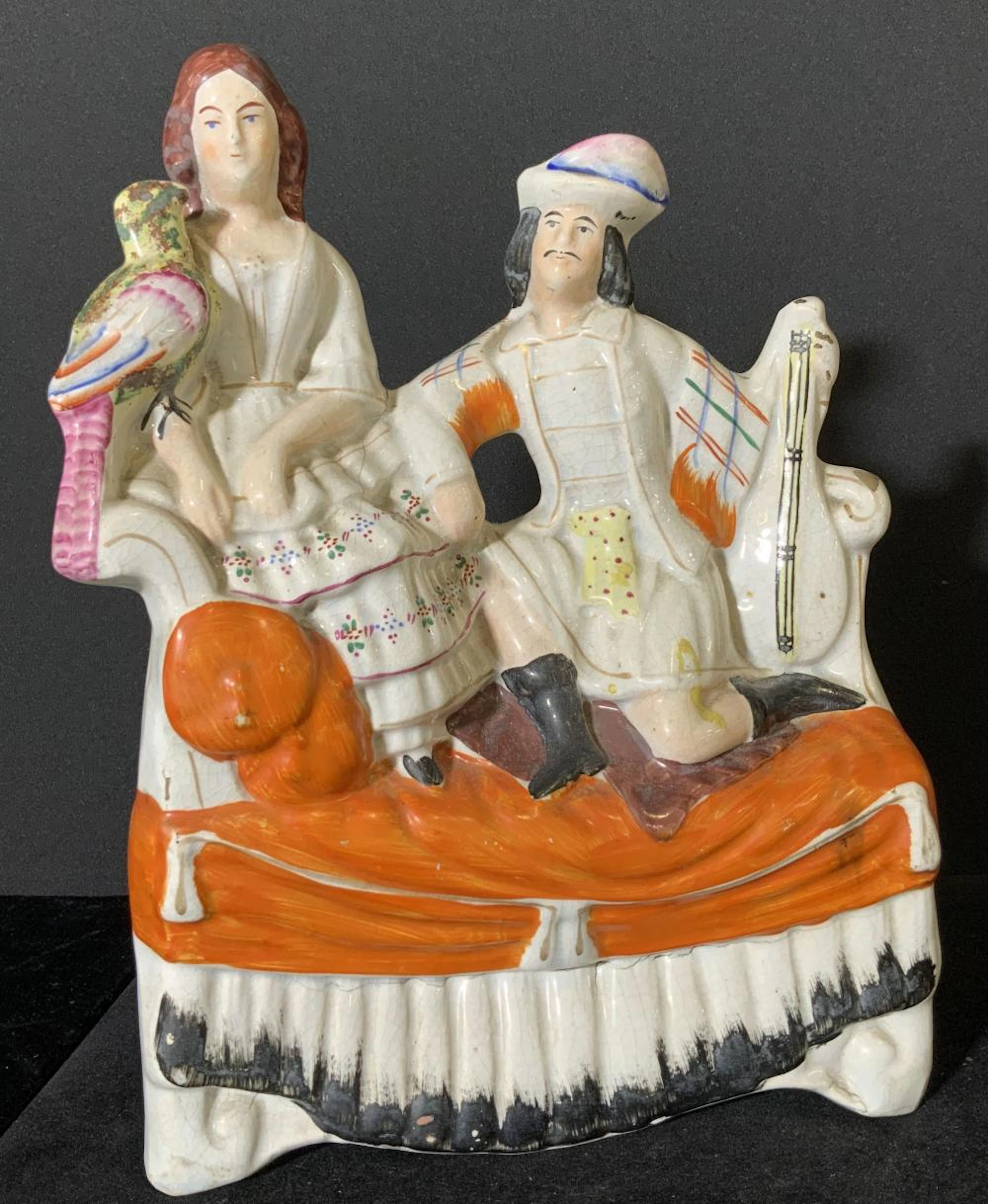 STAFFORDSHIRE Antique Couple On Sofa Figural