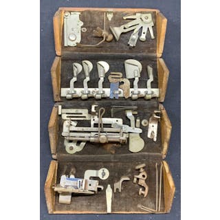 1889 Sewing Machine Attachments in Puzzle Box
